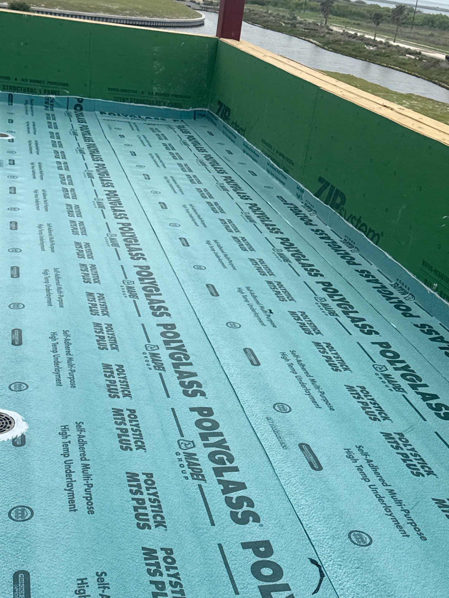 Walk Out, Island Style by Bayfront Roofing and Construction
