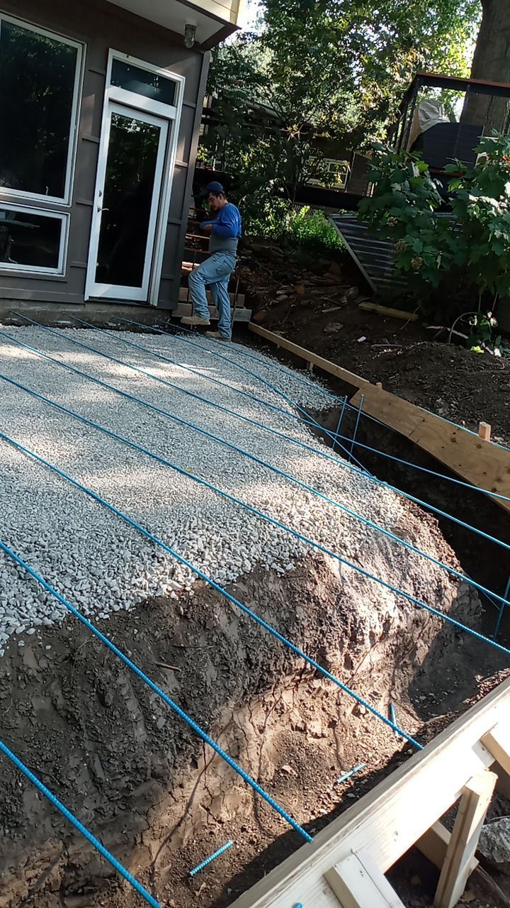 Back Yard Cantilivered Patio by LAND ESCAPES LLC