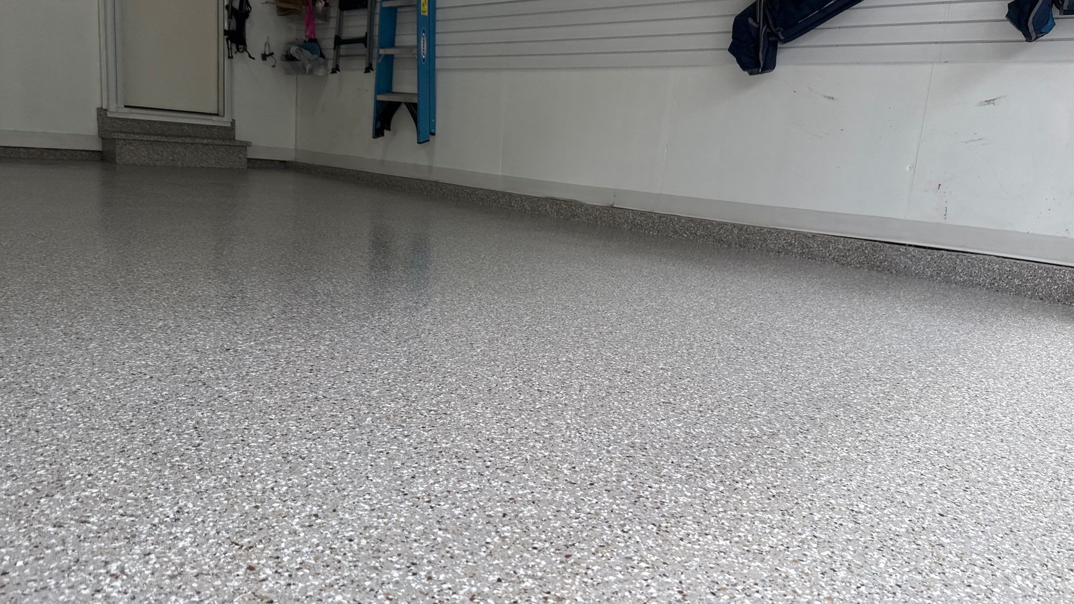 Rachelle & Norman Have a Beautiful New Floor  by Banner Garage