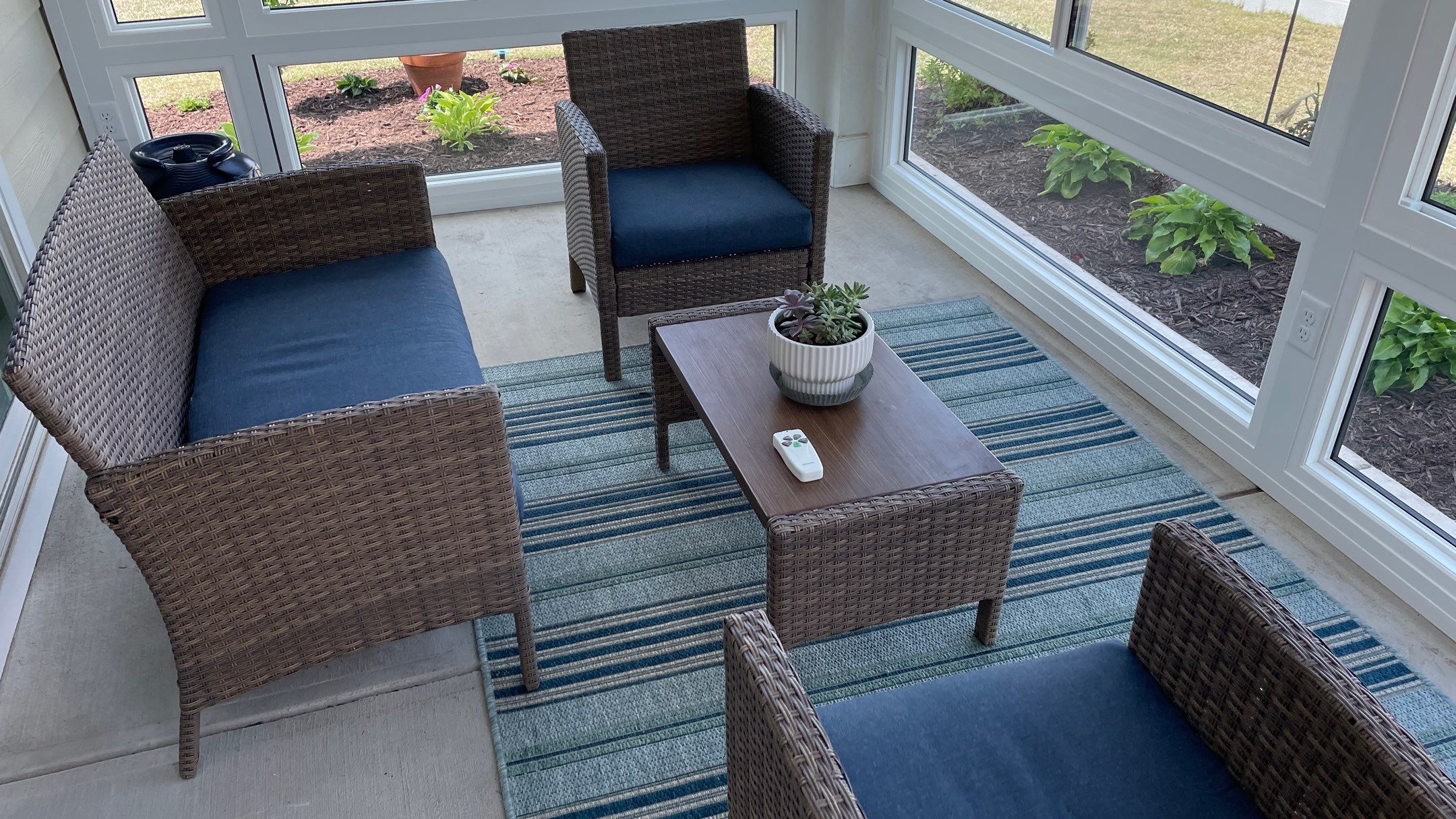 Amazing Tile Transformation After Enclosed Windows Added to Sunroom by Footprints Floors of Coastal Carolina