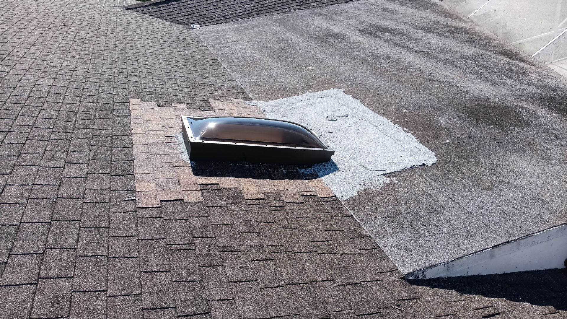 REPLACE NON APPROVED SKYLIGHT ALONG WITH CLOGED GUTTER by Morton Roofing, Inc.