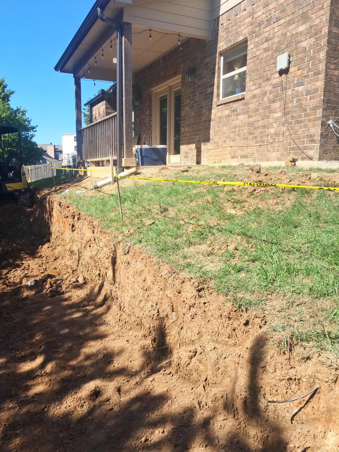Custom Segmental Block Retaining Wall and Sod Installation in Lawton by Clays Services Inc