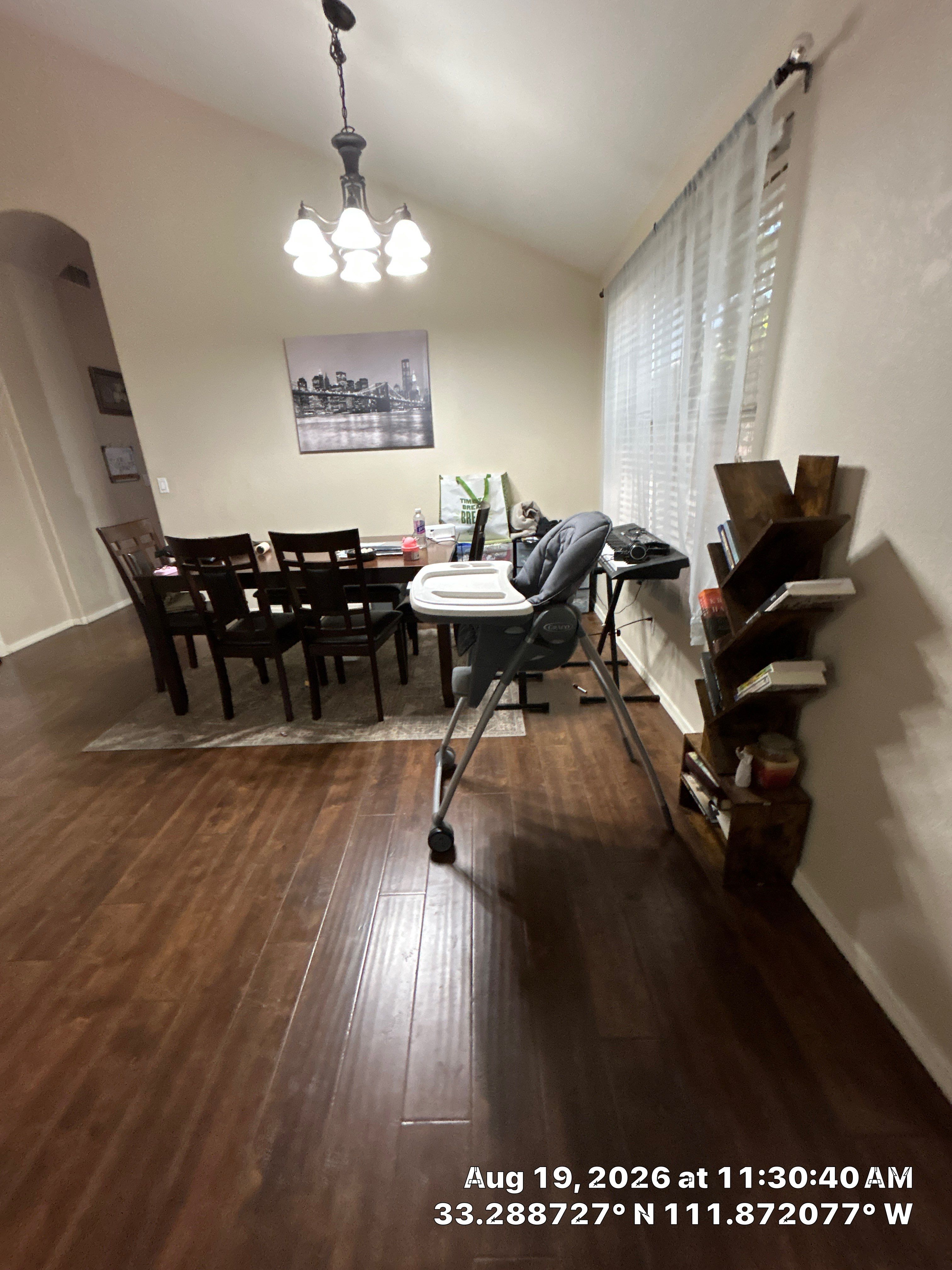 Dark Wood Laminate Flooring Installation for Chandler Dining Room by CompanyCam Sales Demo