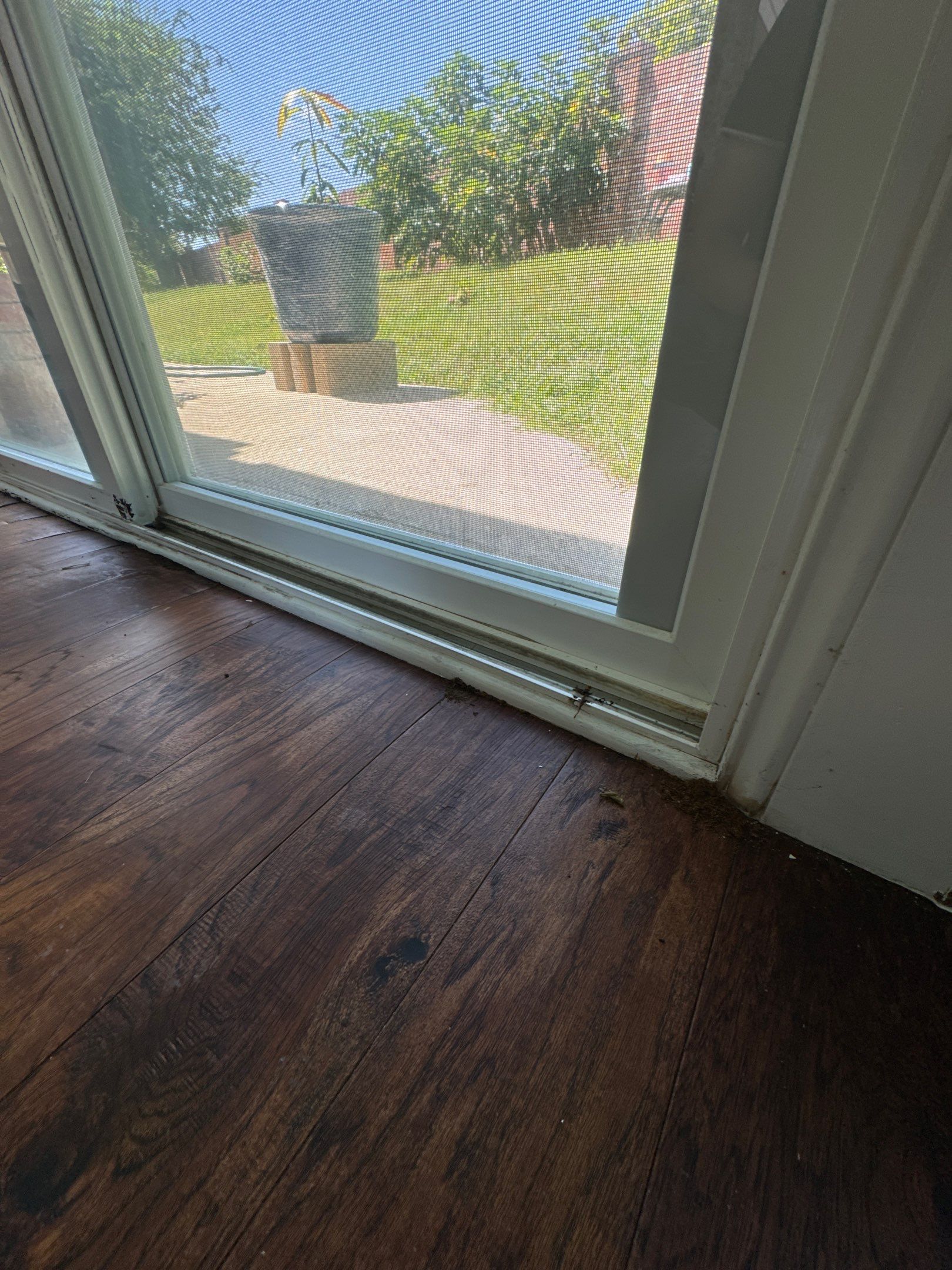 Seamless Floor Upgrade & Critical Water Damage Repair: Complete Patio Door Fix by Tibi Soli LLC