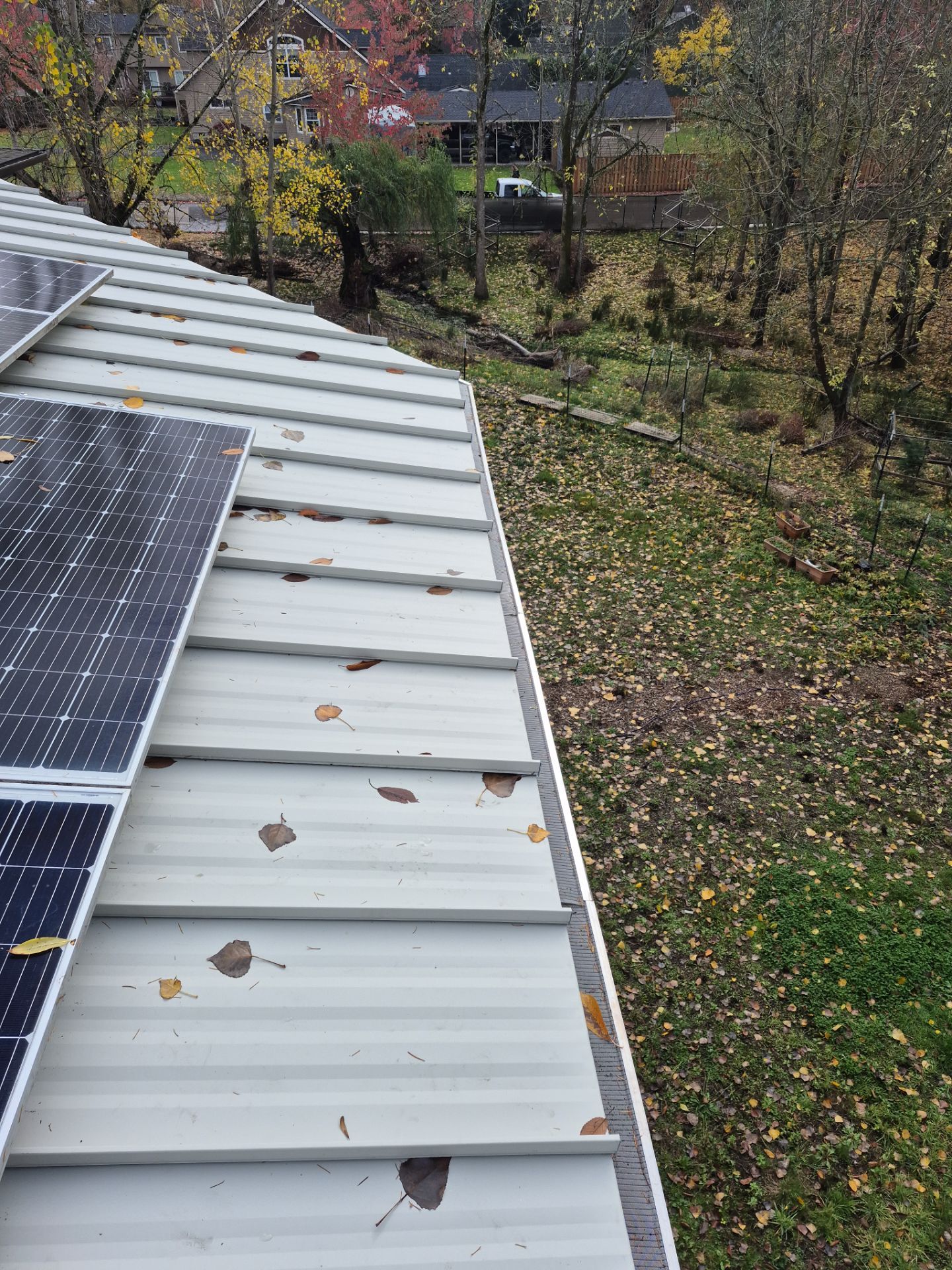 New Metal Roof and replace solar panels by Hawthorne General Construction