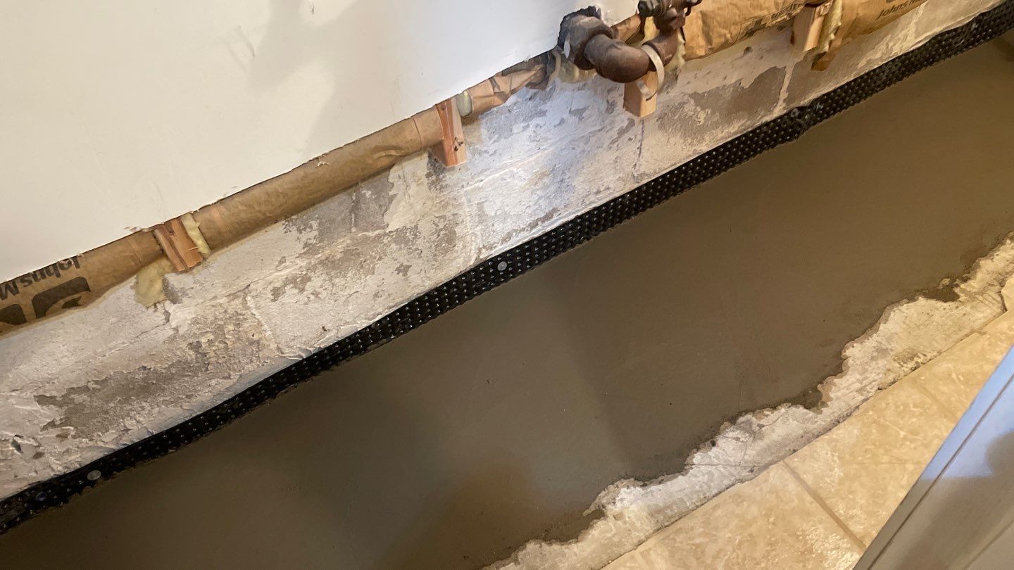 Drain Tile in Minneapolis for Kristen & Taylor by Waterproofing Northeast