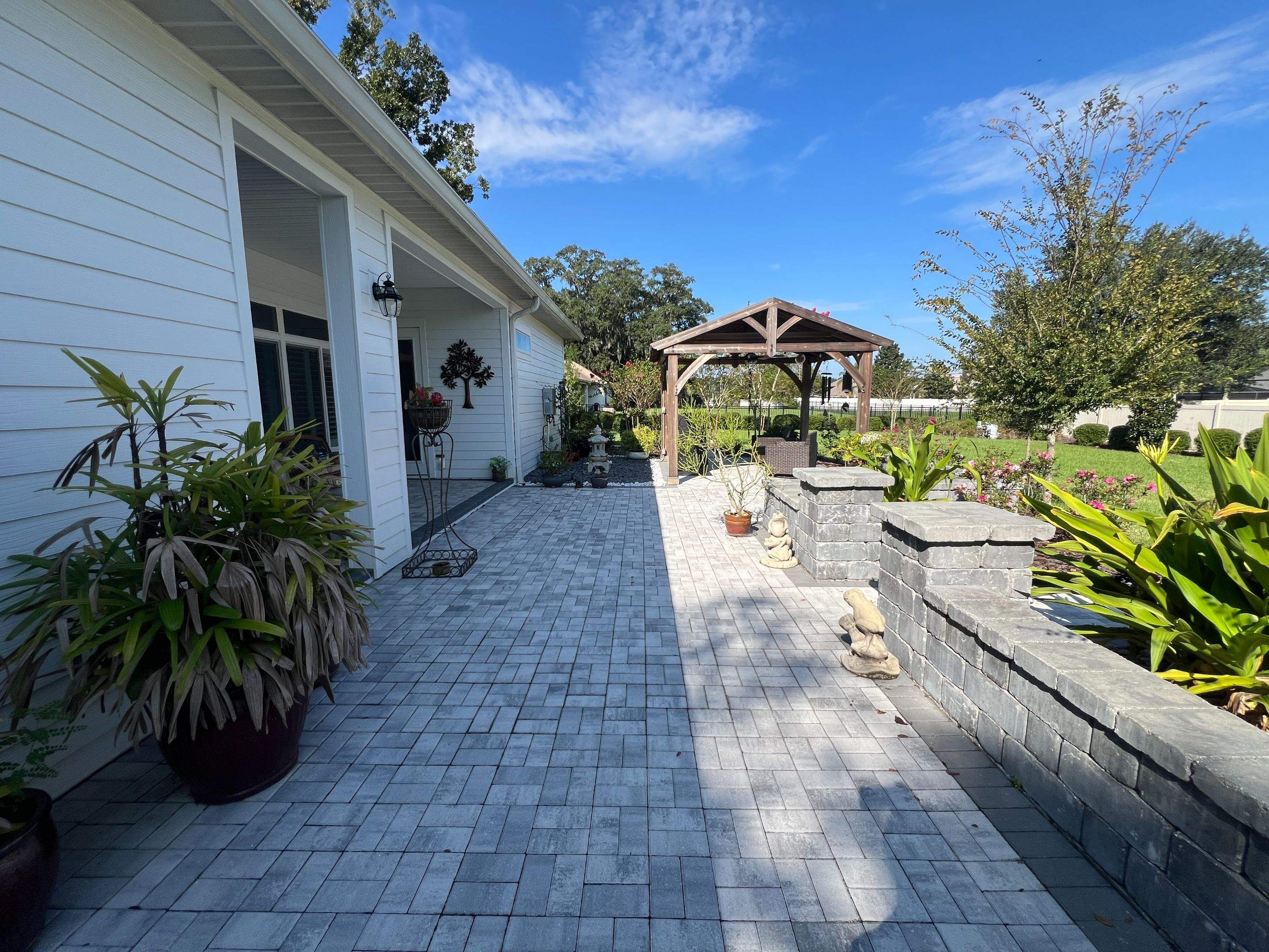 Paver Driveway and Backyard Patio Sealing in Ocala by Infinite Exteriors LLC