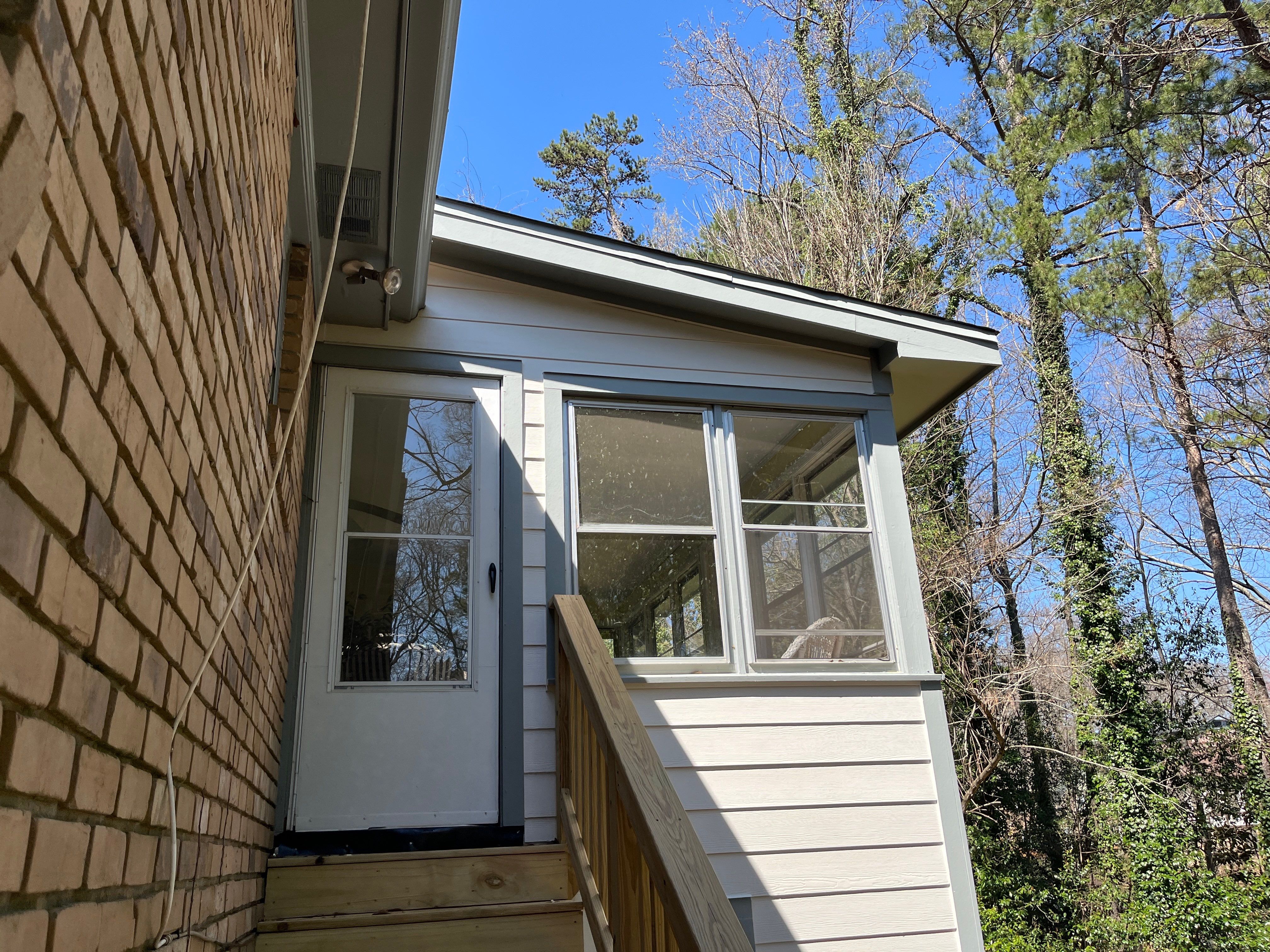 Board and Batten Siding Installation and Railing Replacement in Lilburn, GA by Nelson Exteriors