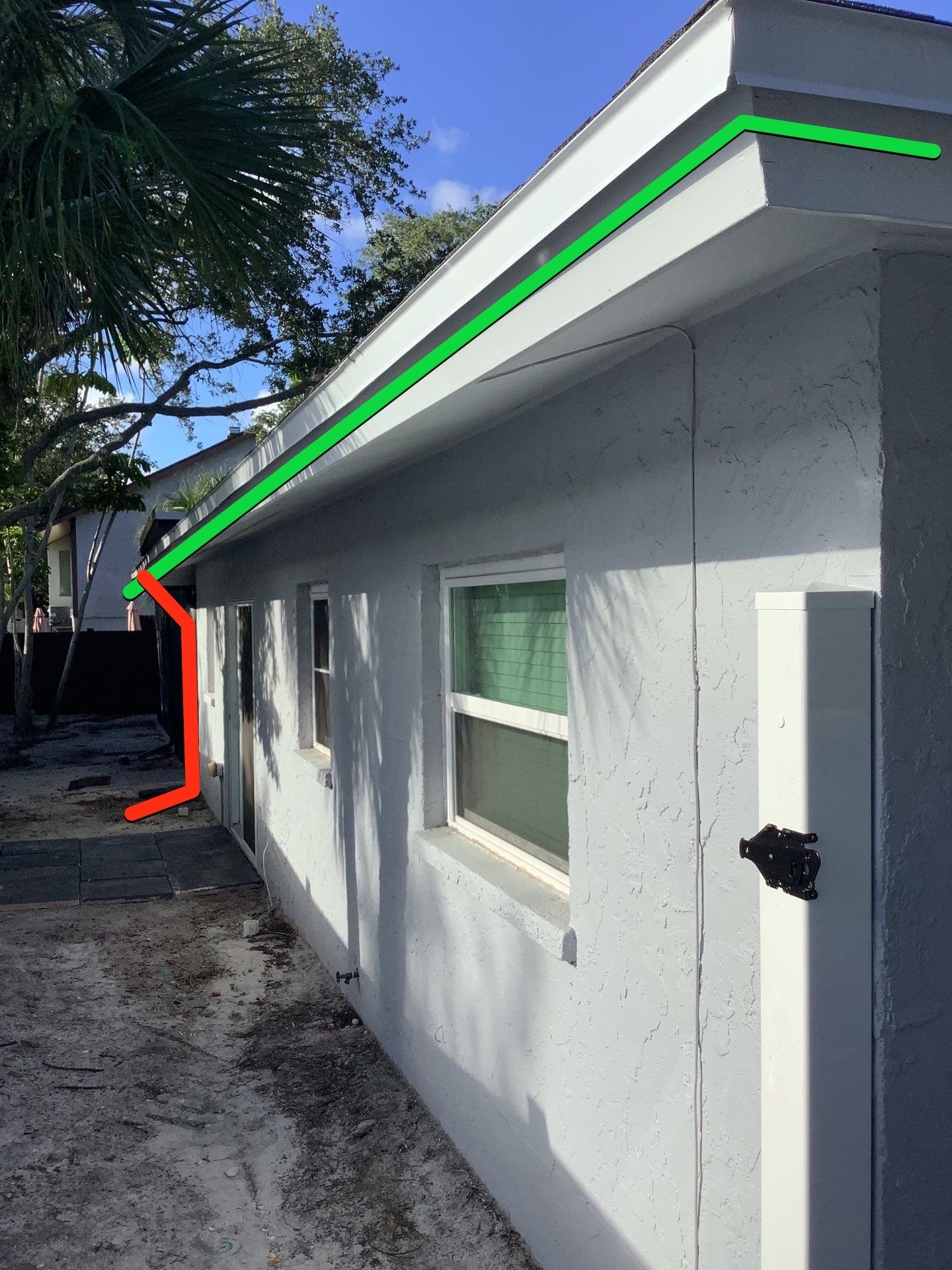 Black Seamless Gutters Installation in Siesta Key FL by Gutter Professors