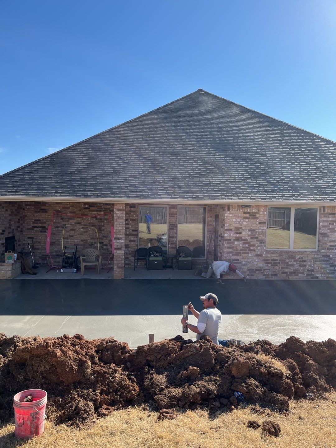 Concrete Slab , Retaining Wall , Fence, and landscape. by Clays Services Inc