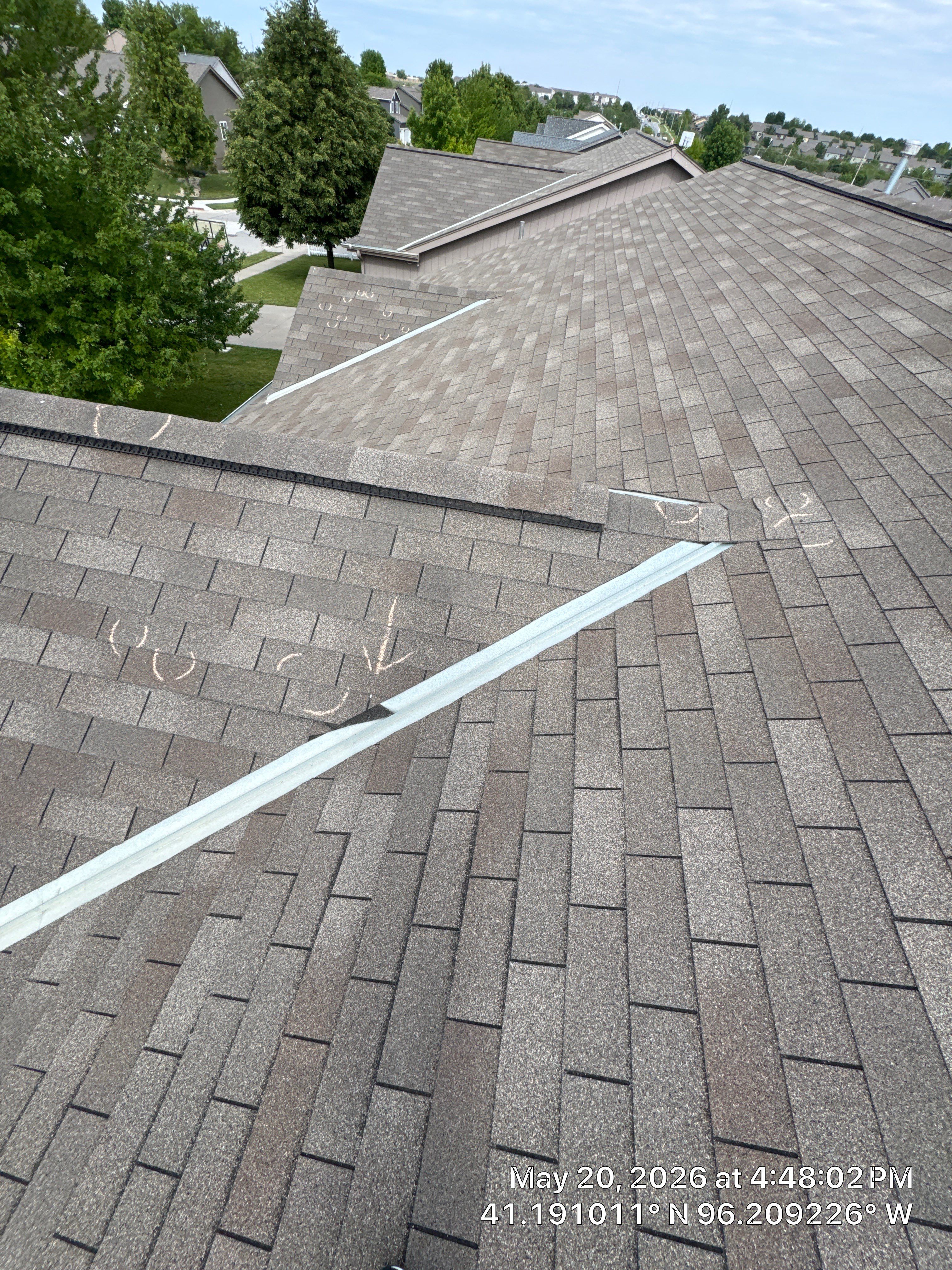 Storm Damage Restoration for Residential Asphalt Shingle Roof in Omaha by Crows Roofing LLC