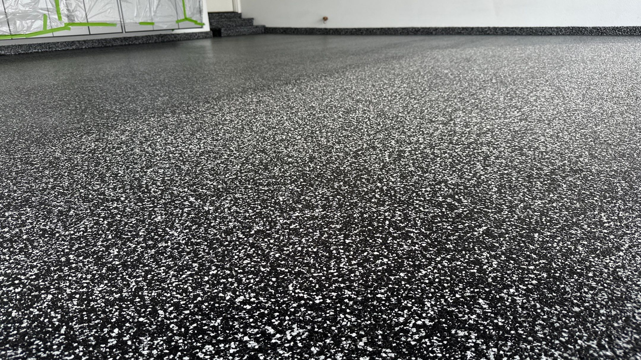 John H. received his dream garage with cabinets and a Banner Garage Floor by Banner Garage