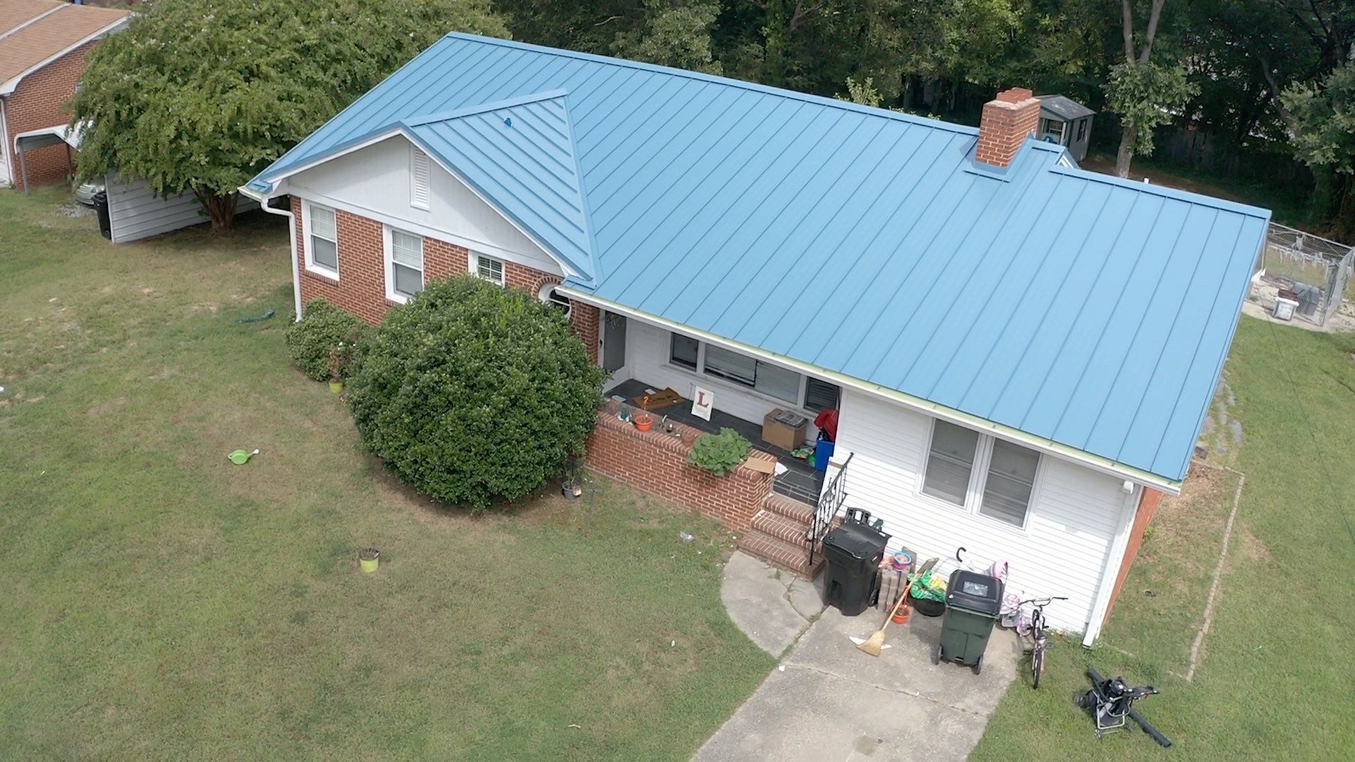 Carolina Blue Standing Seam Roof by Just In Time Roofing and Restoration
