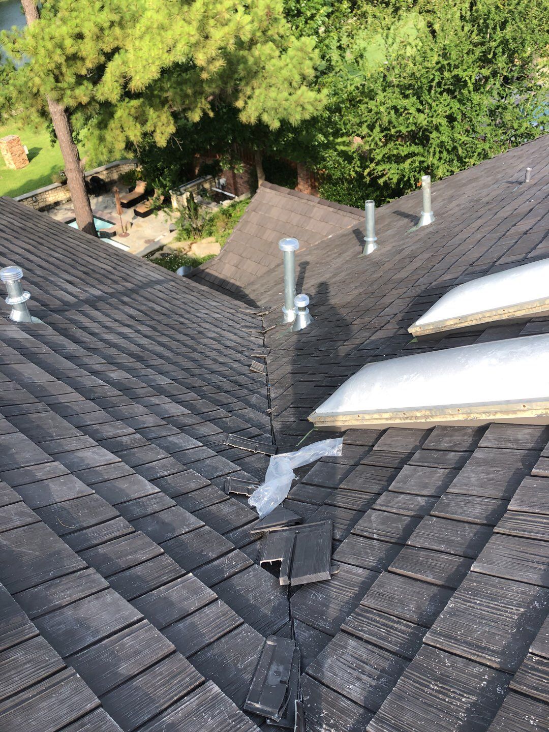Designer Residential Roof with Zip System by Springtree Restoration