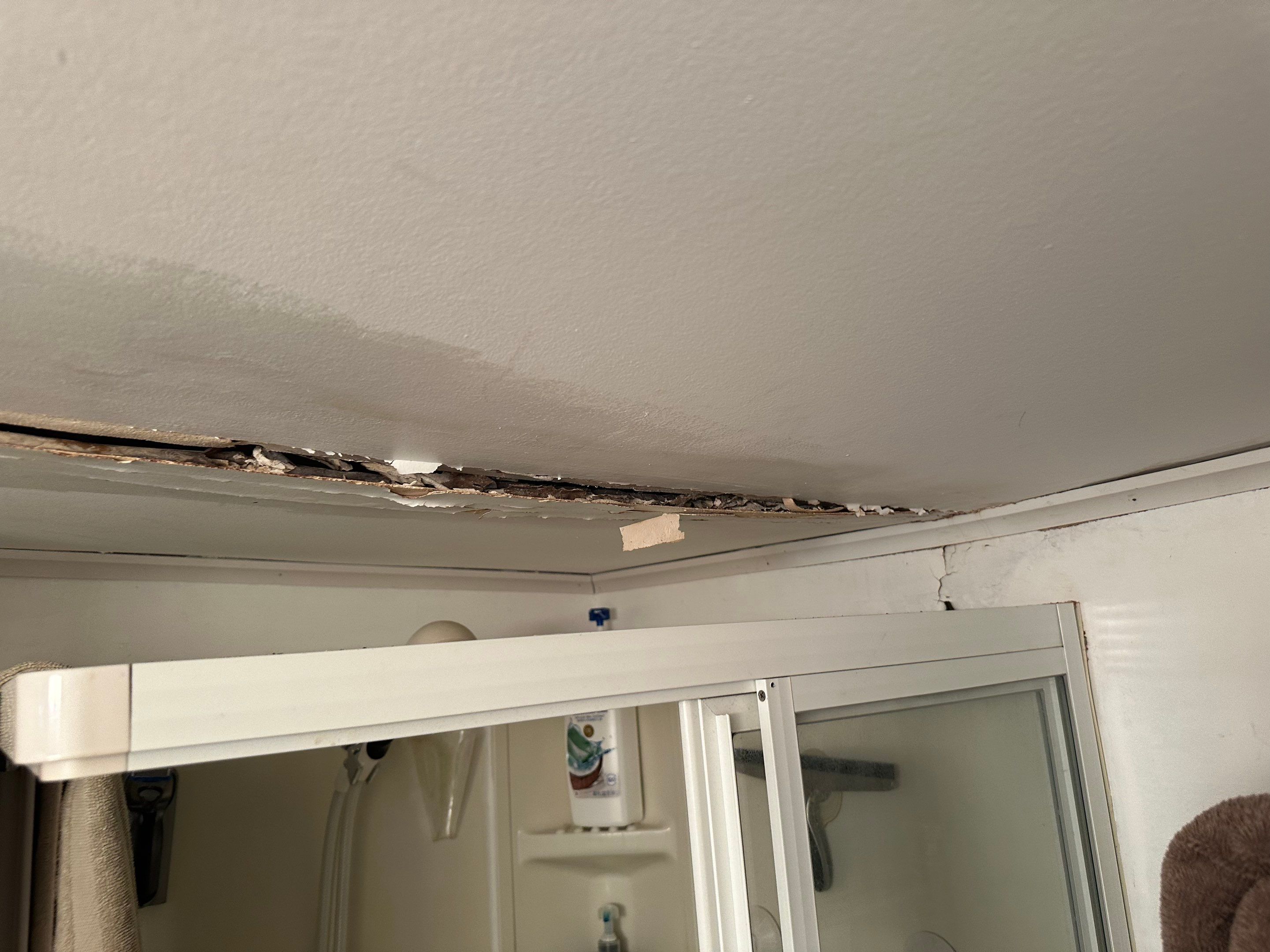 Bathroom Ceiling Replacement by BlueRed Restoration