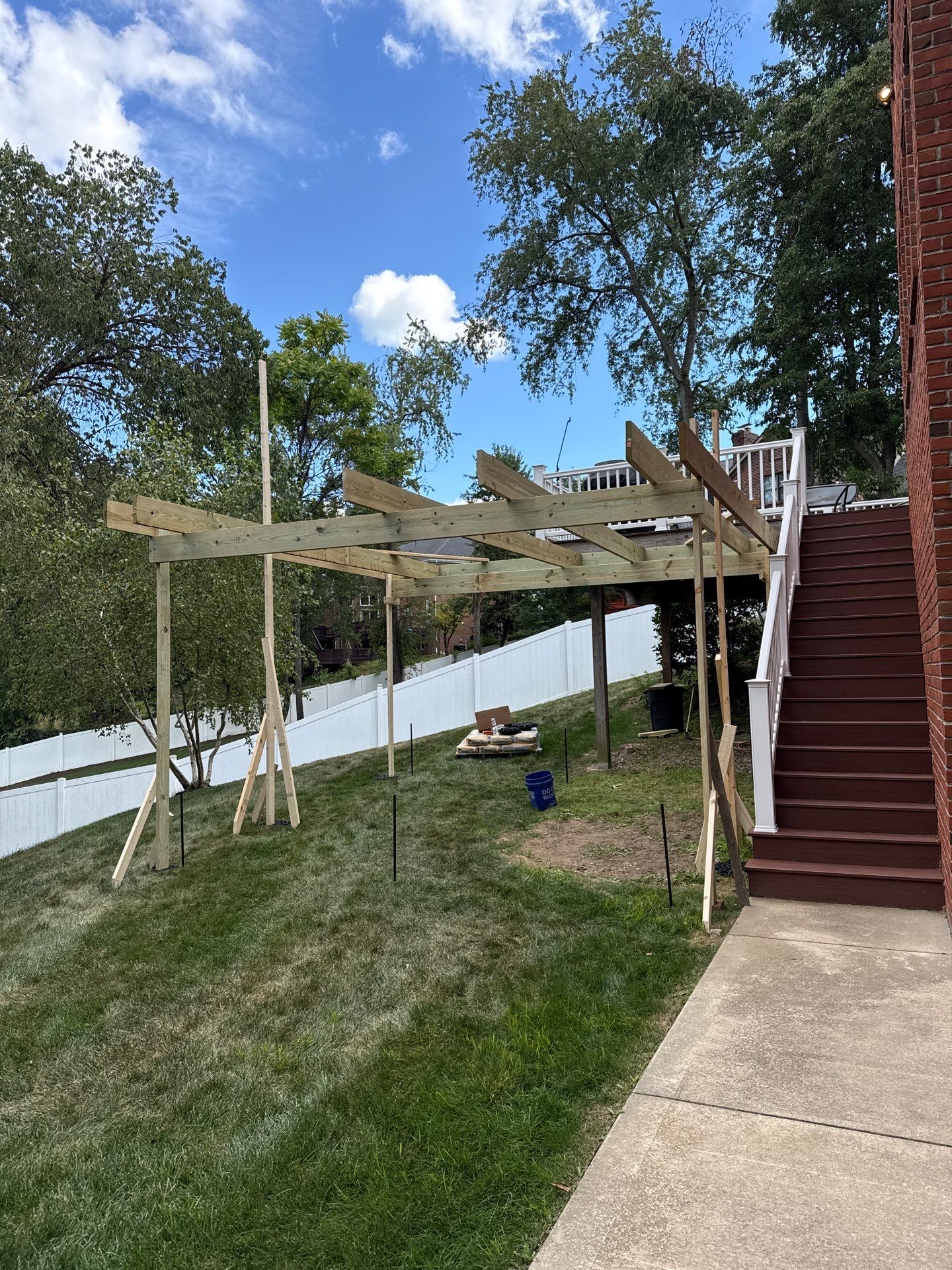 Deck extension  by Cousins Roofing Siding & Decks