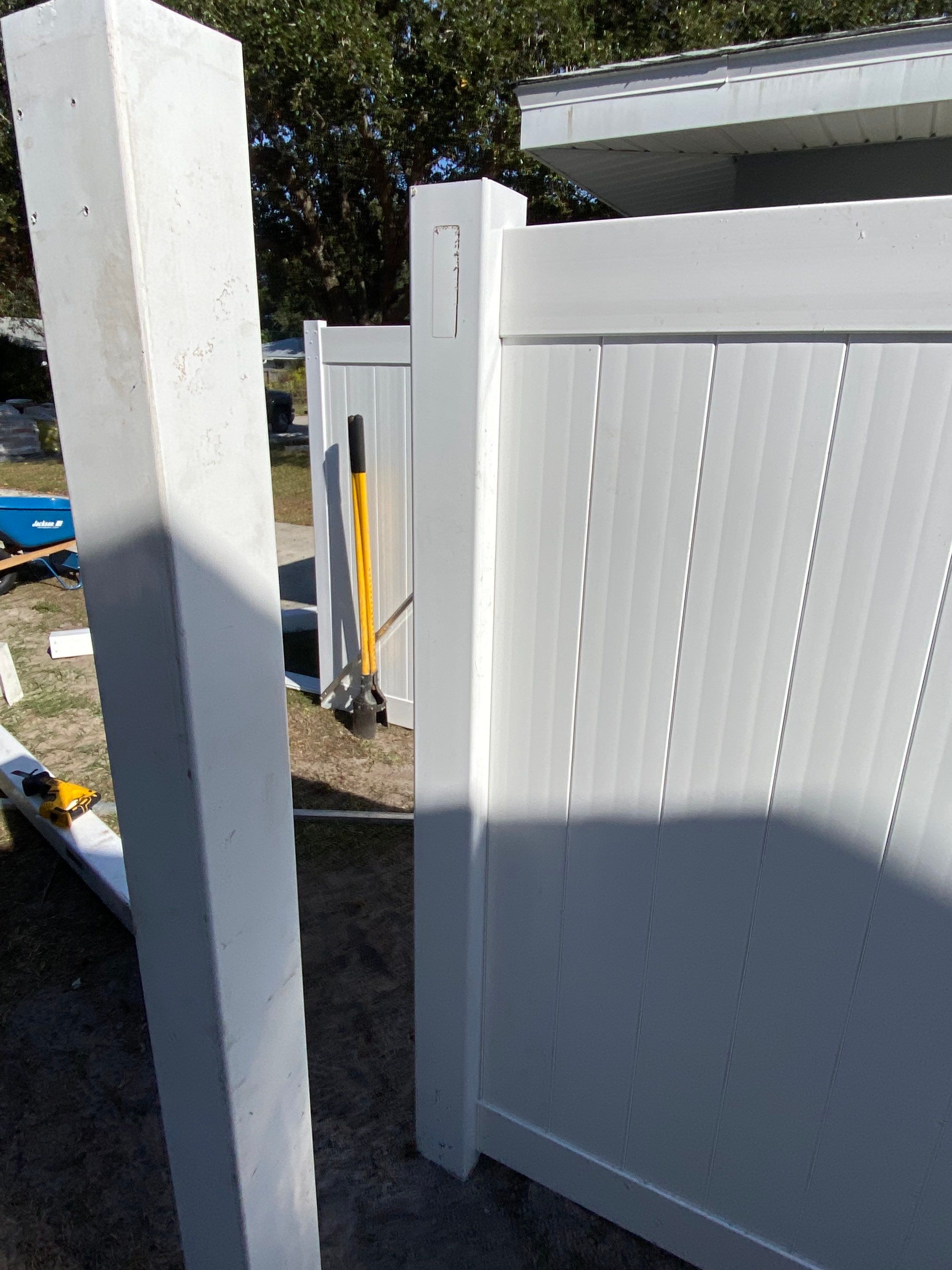 Vinyl Privacy Fence With AC Enclosure and Storage Corral by Asap fence and gates, LLC