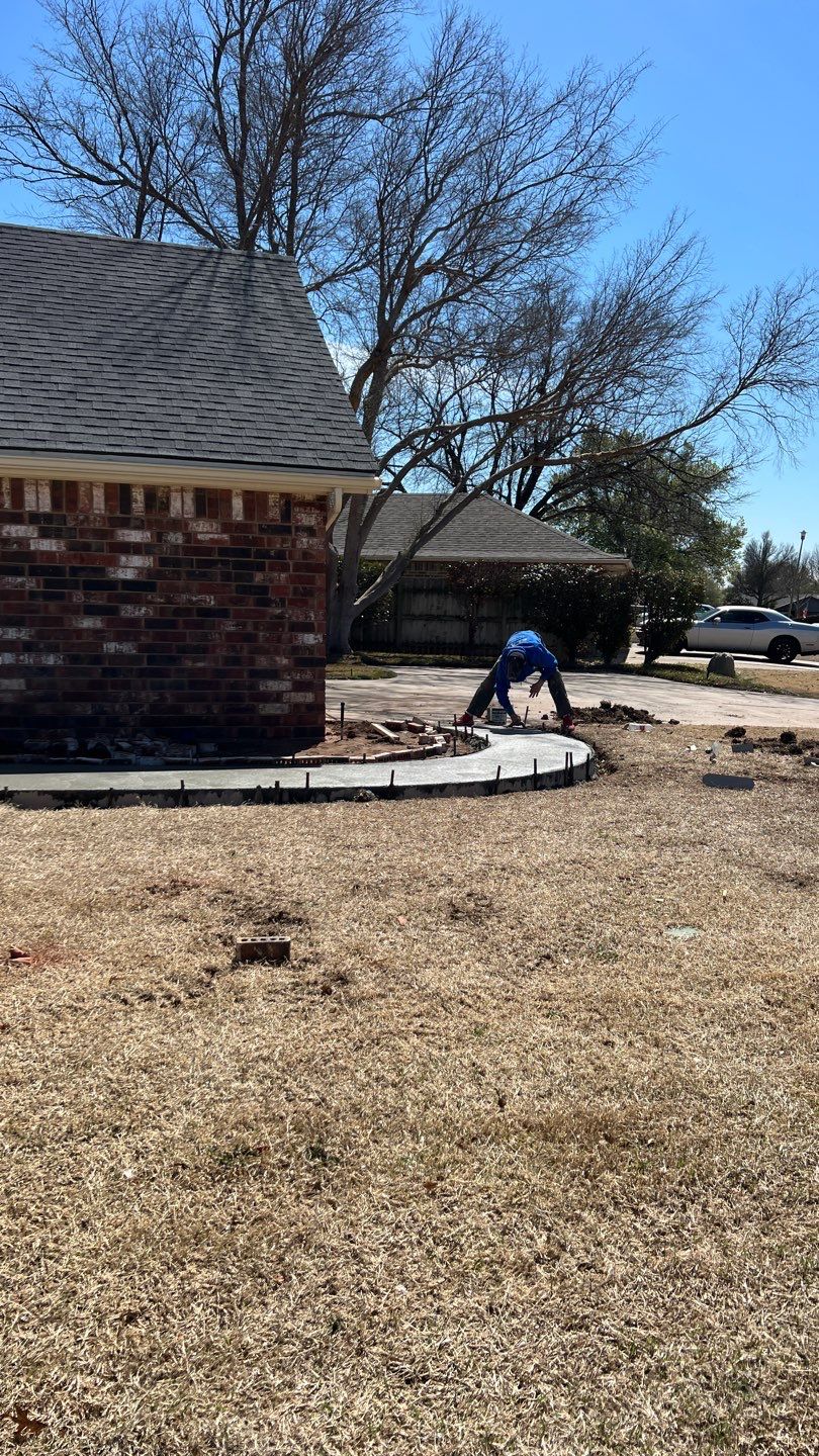 Concrete sidewalk using Concrete by Clays Services Inc