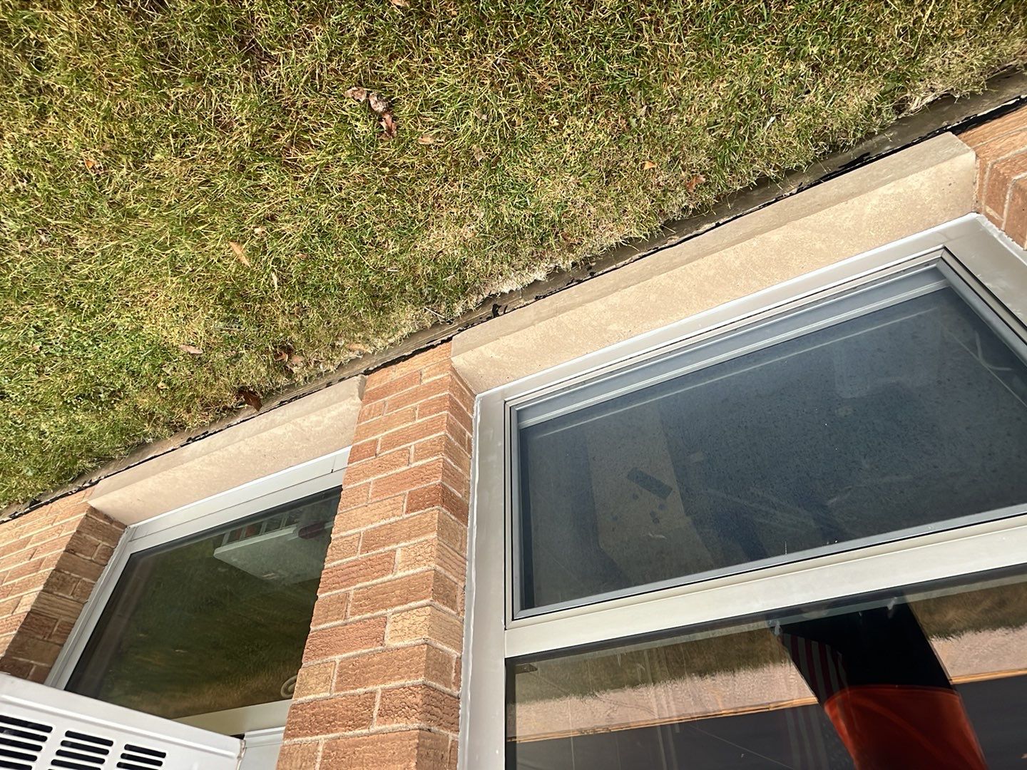 Commercial brick exterior cleaning by Northern Power Washing LLC.