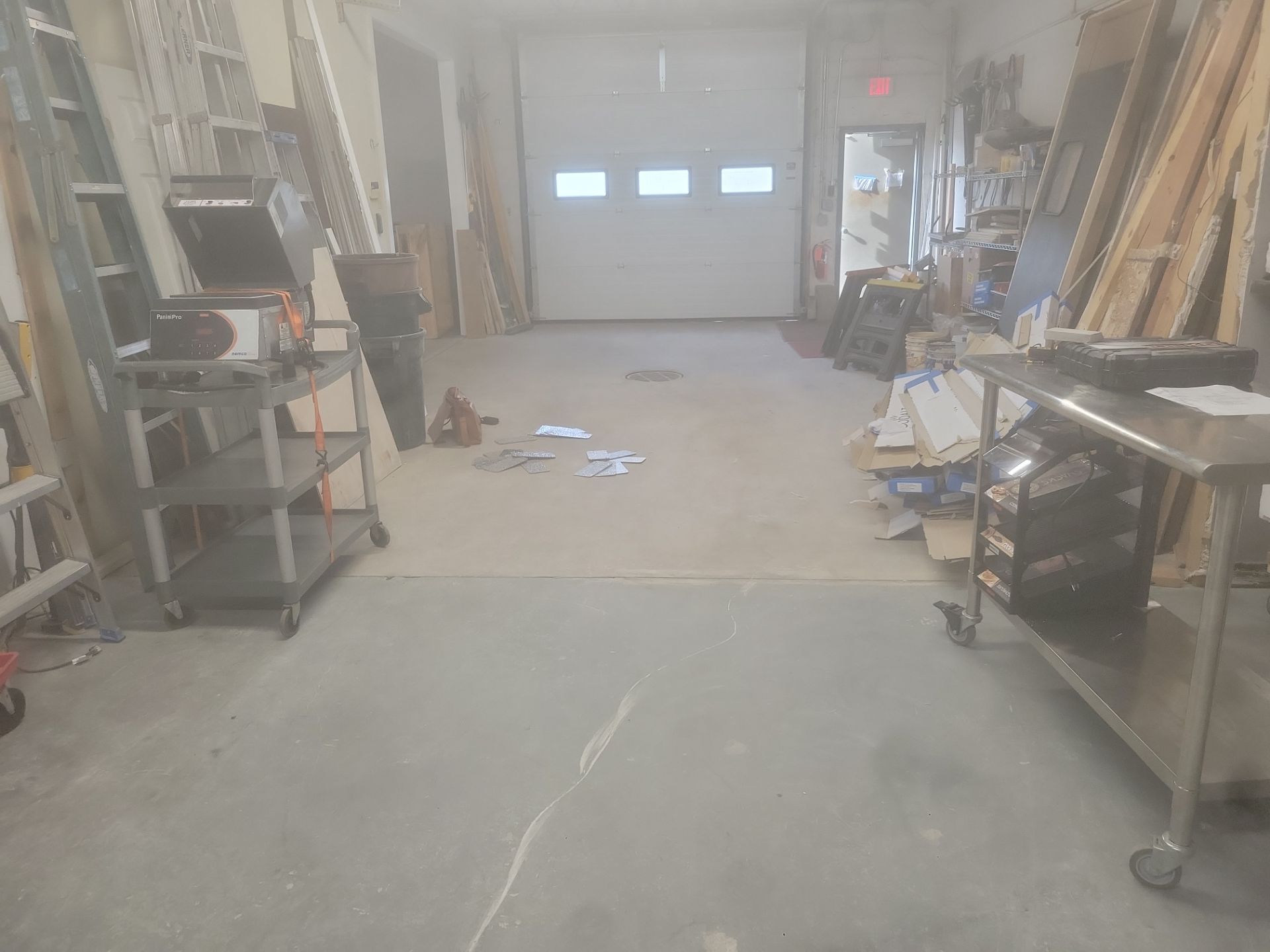 Silverado garage floor coating  by NG Masonry & Construction LLC