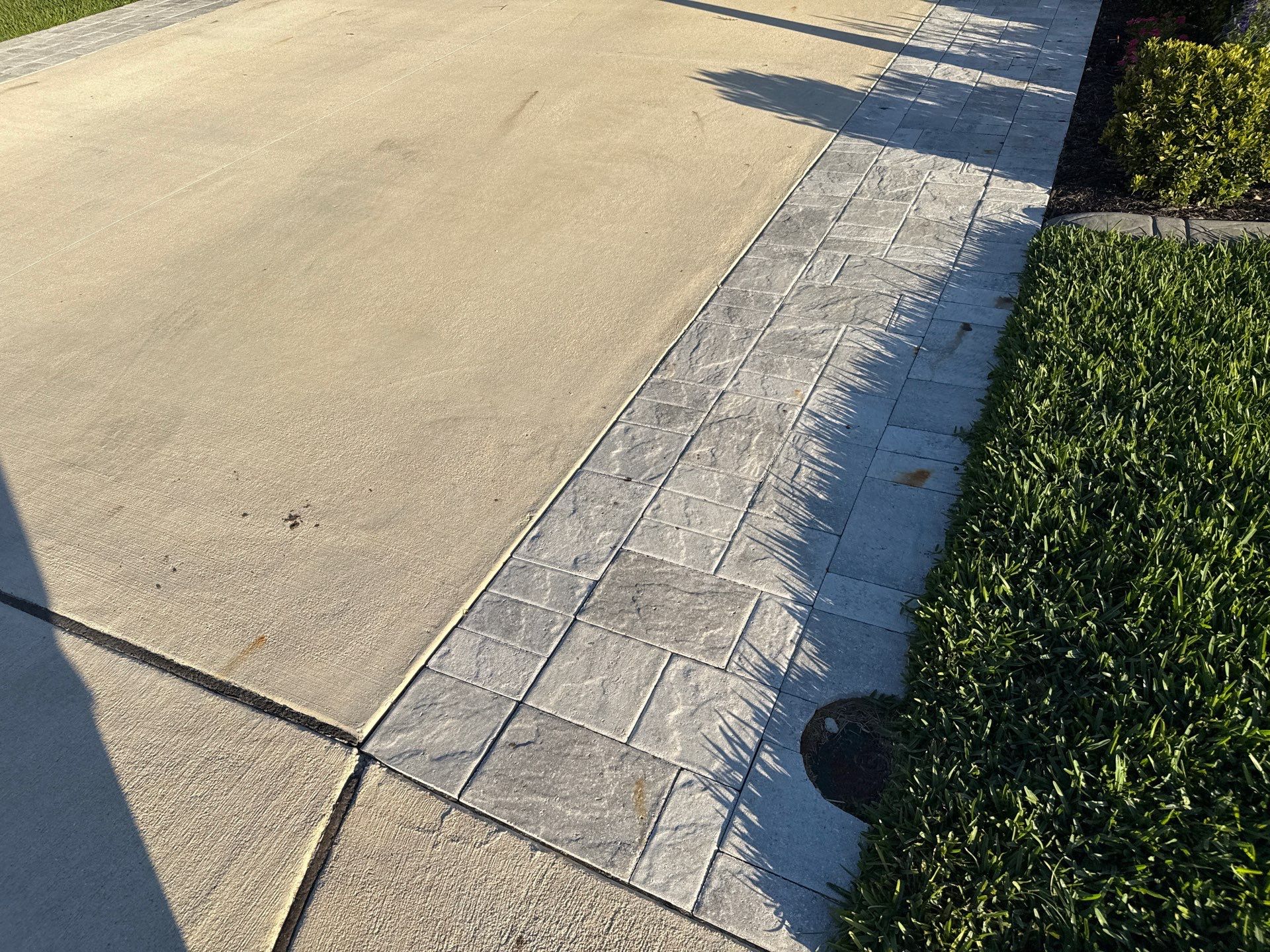 Rust Stain Removal from Concrete Driveway and Pavers in Park East at Azario | Lakewood Ranch, FL by Sunshine AquaWash