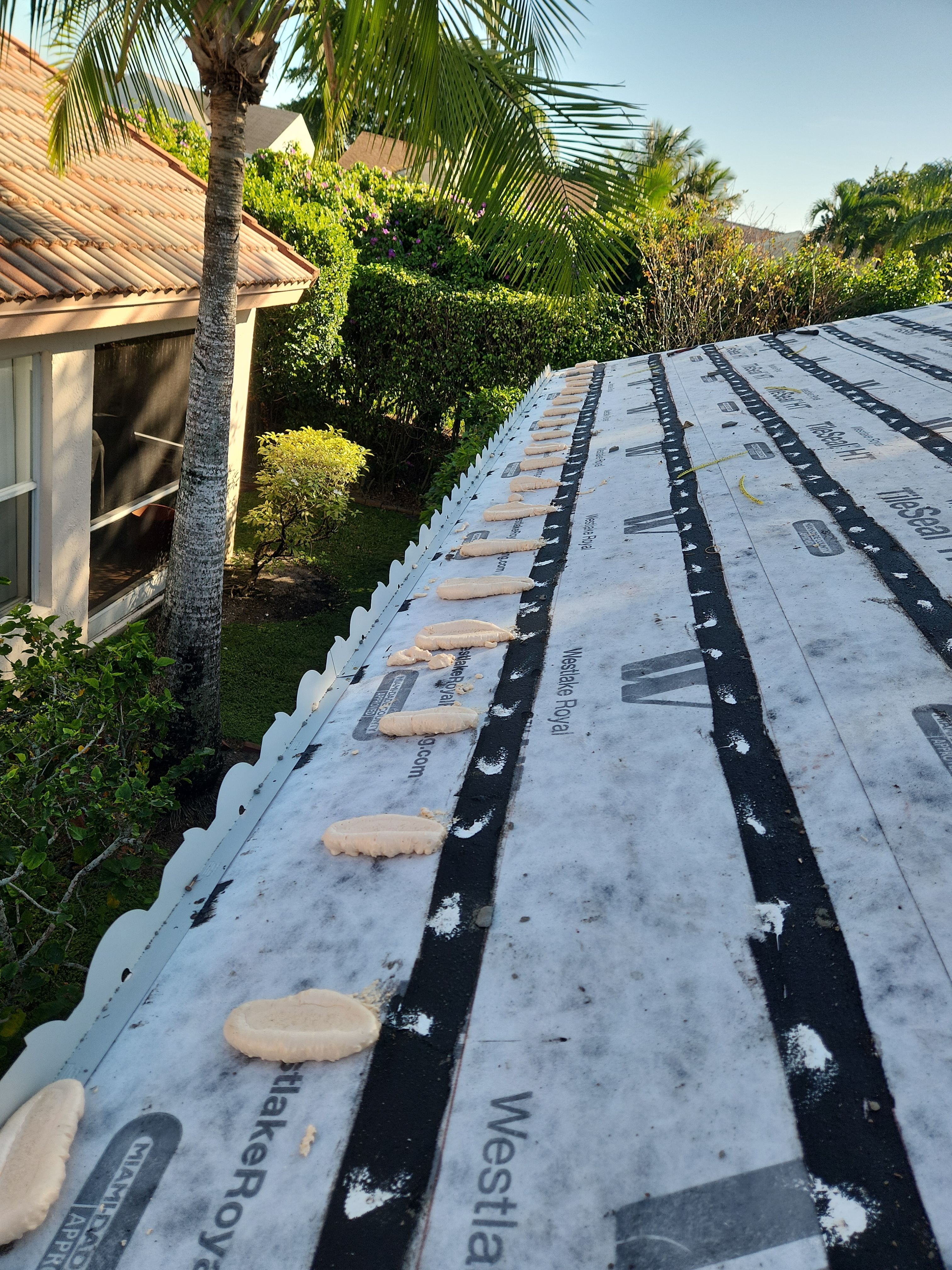 Concrete Tile Roof Replacement and Wood Decking Repair in Boca Raton by Aastro Roofing