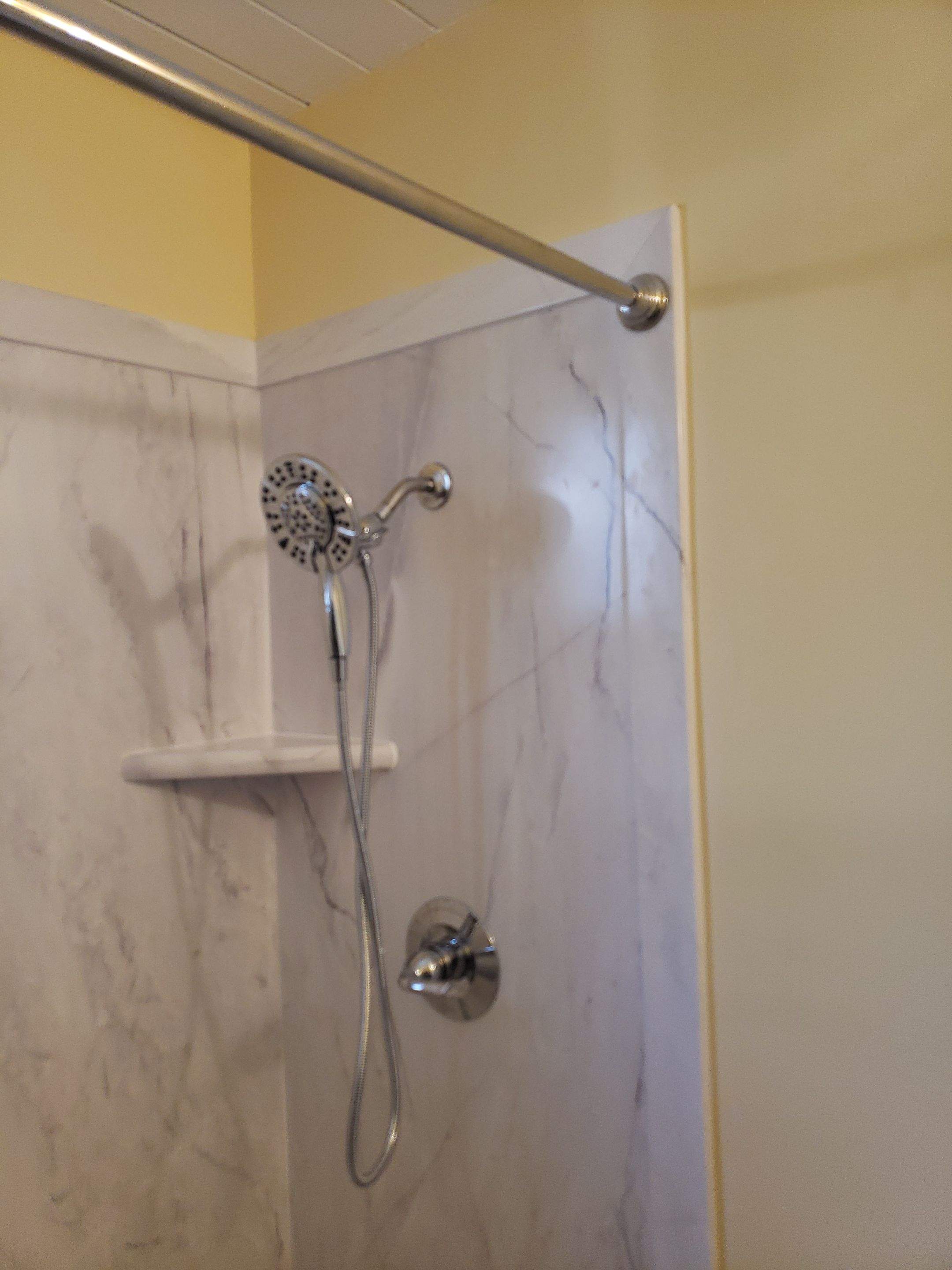 Studs to Stunning: Bathroom Remodel with FlexStone by McCray's Handyman, Inc.