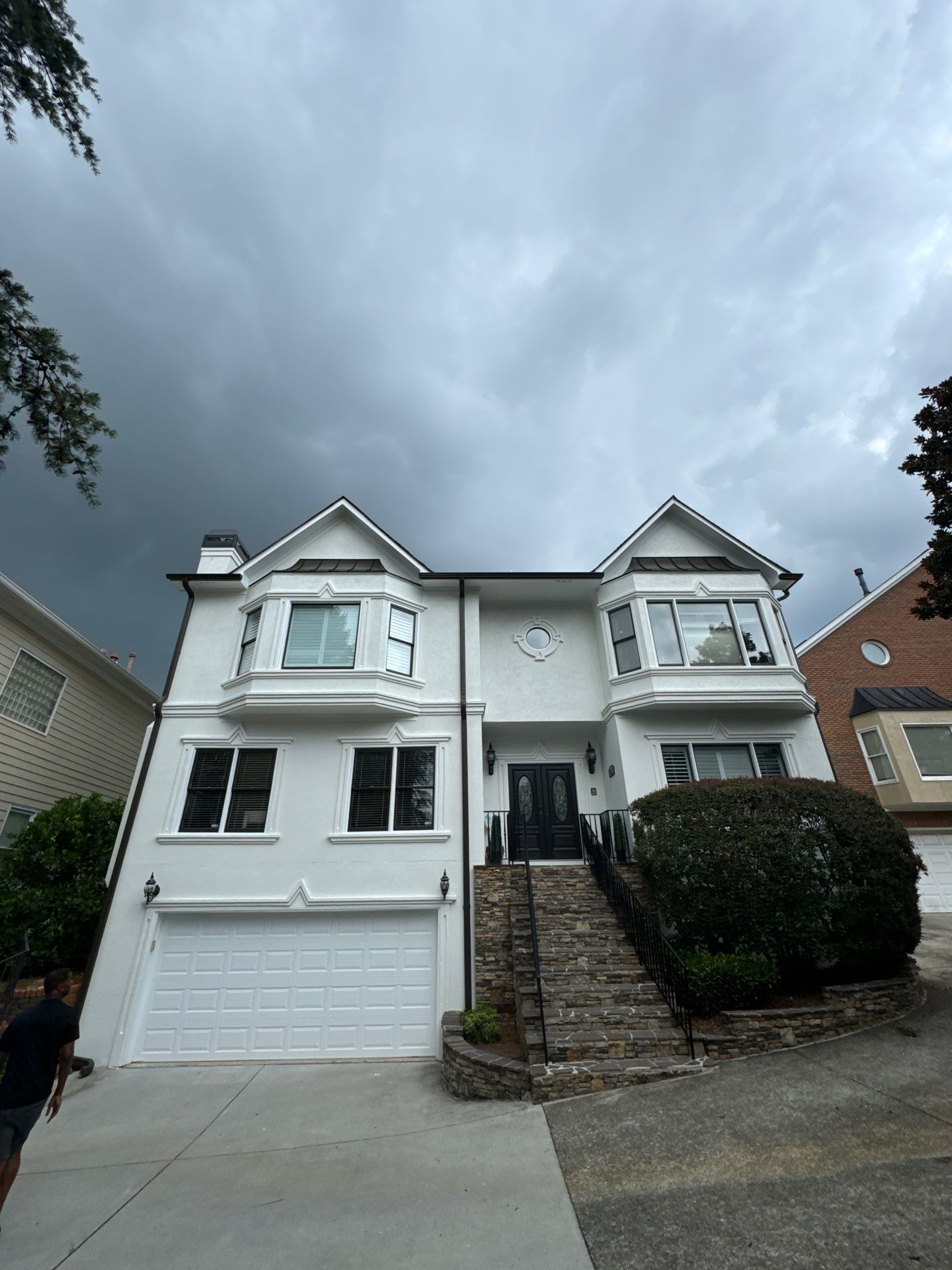 Full Exterior Stucco Painting and Wood Deck Staining in Atlanta by Swift Home Renovations