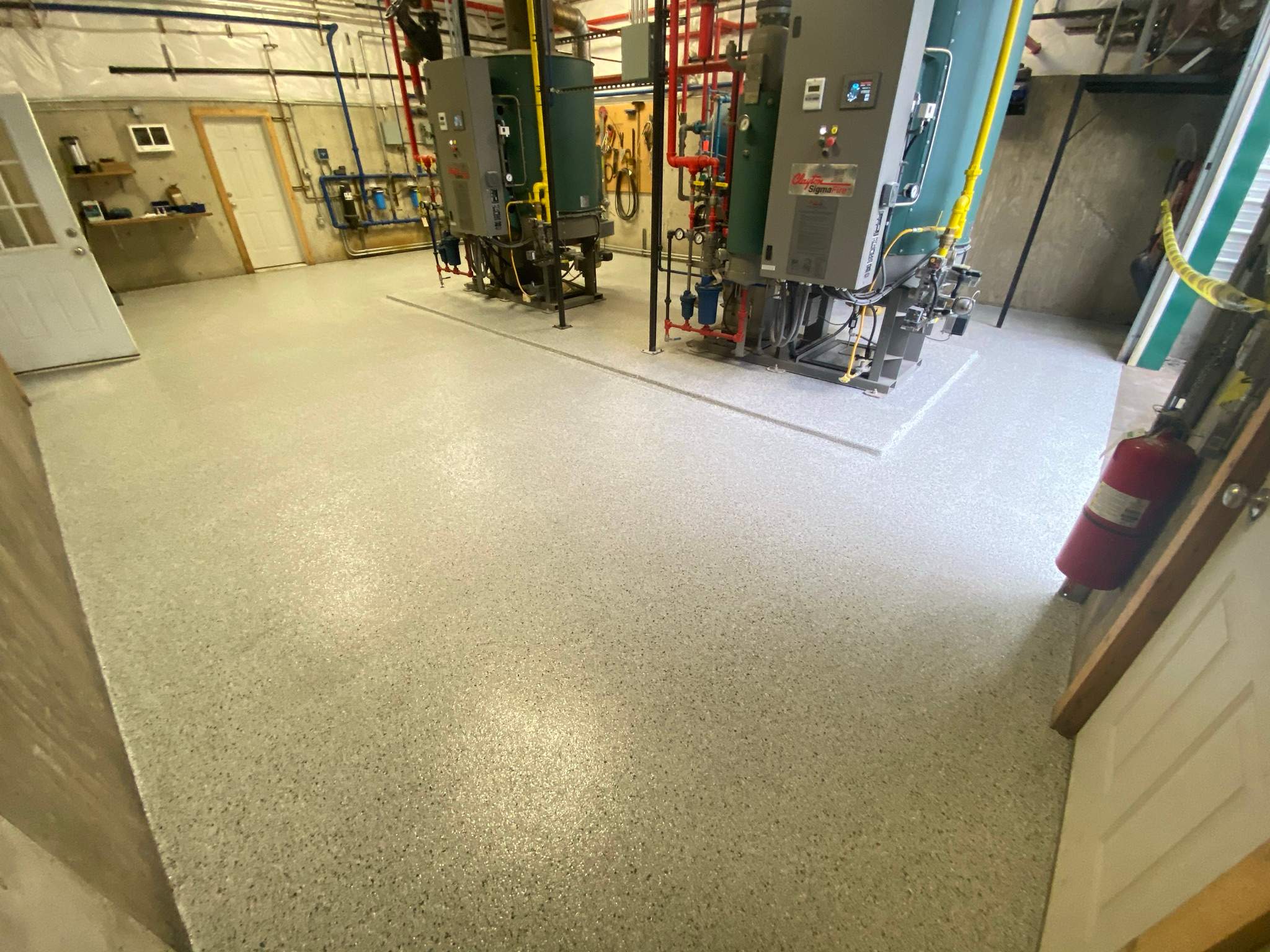 Commercial Floor Transformation using North Pole with Green by Croc Coatings, LLC