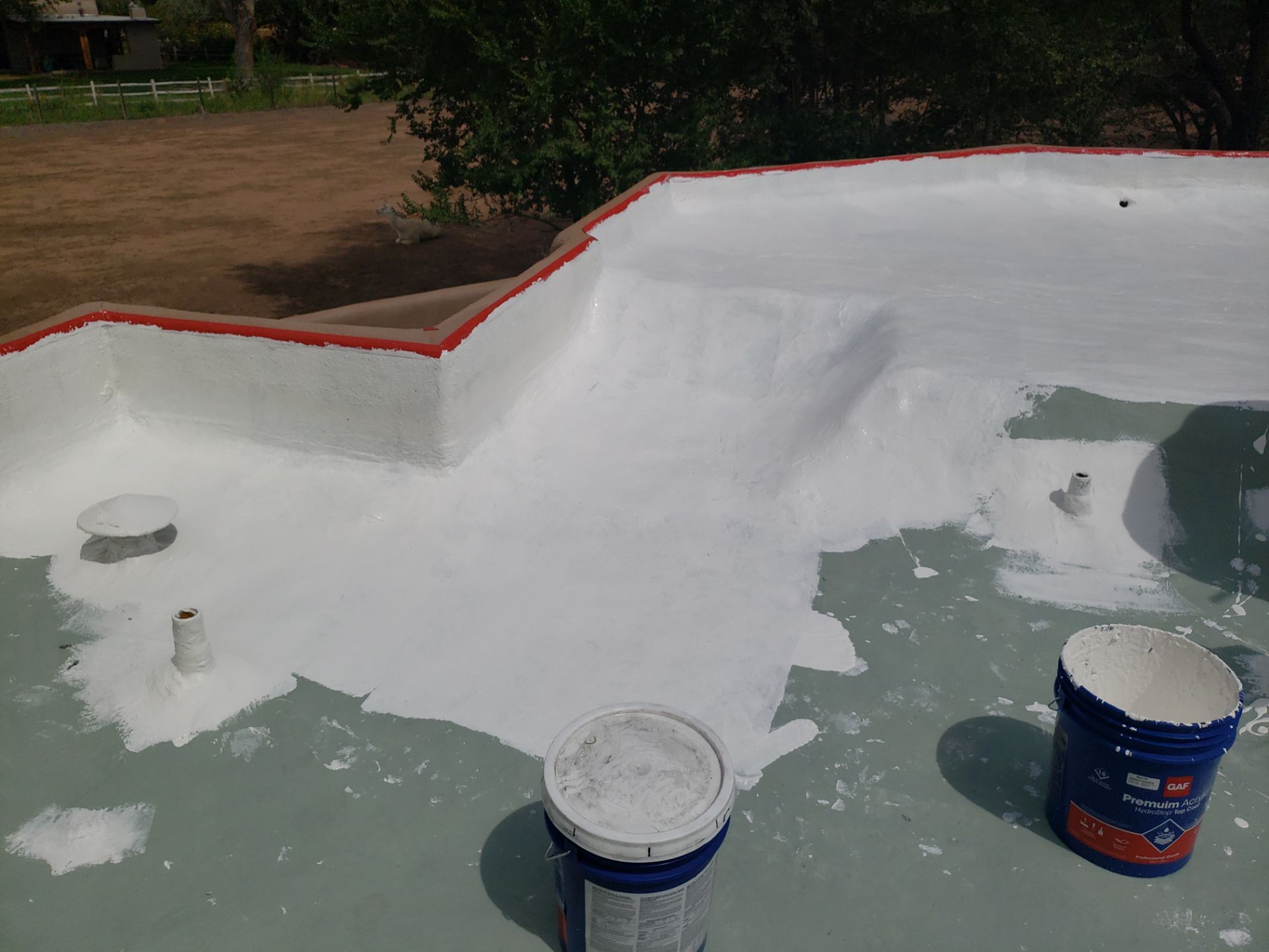 Residential roof application by SPF Services 