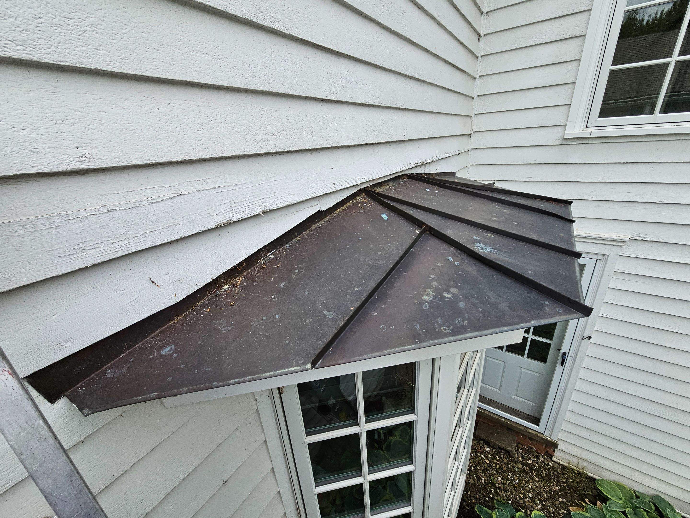 Copper Roof using Copper by Absolute Roofing and Construction