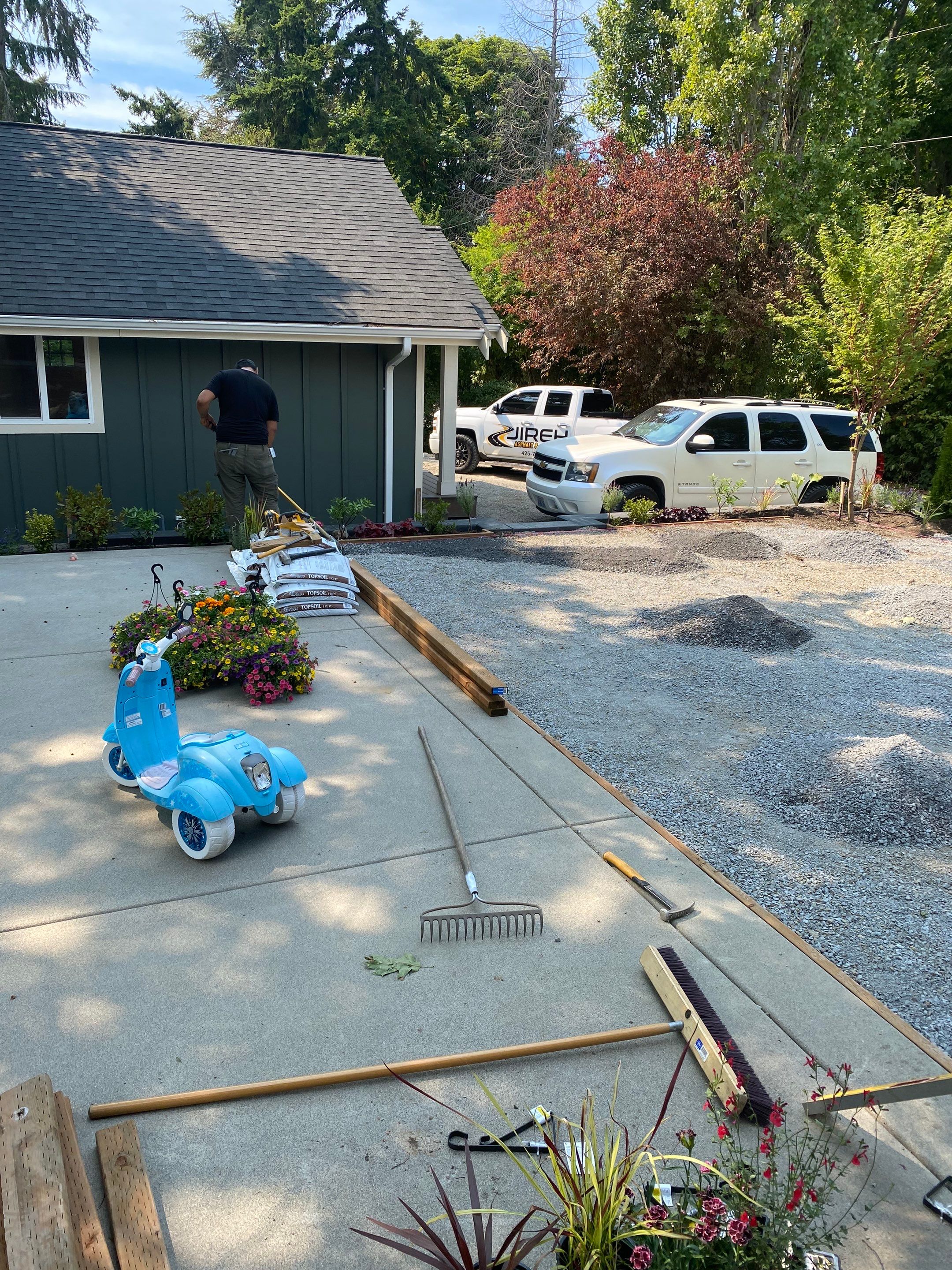 Patio Installation using Concrete, Retaining walls, and Turf install by Jireh Asphalt & Concrete Inc 