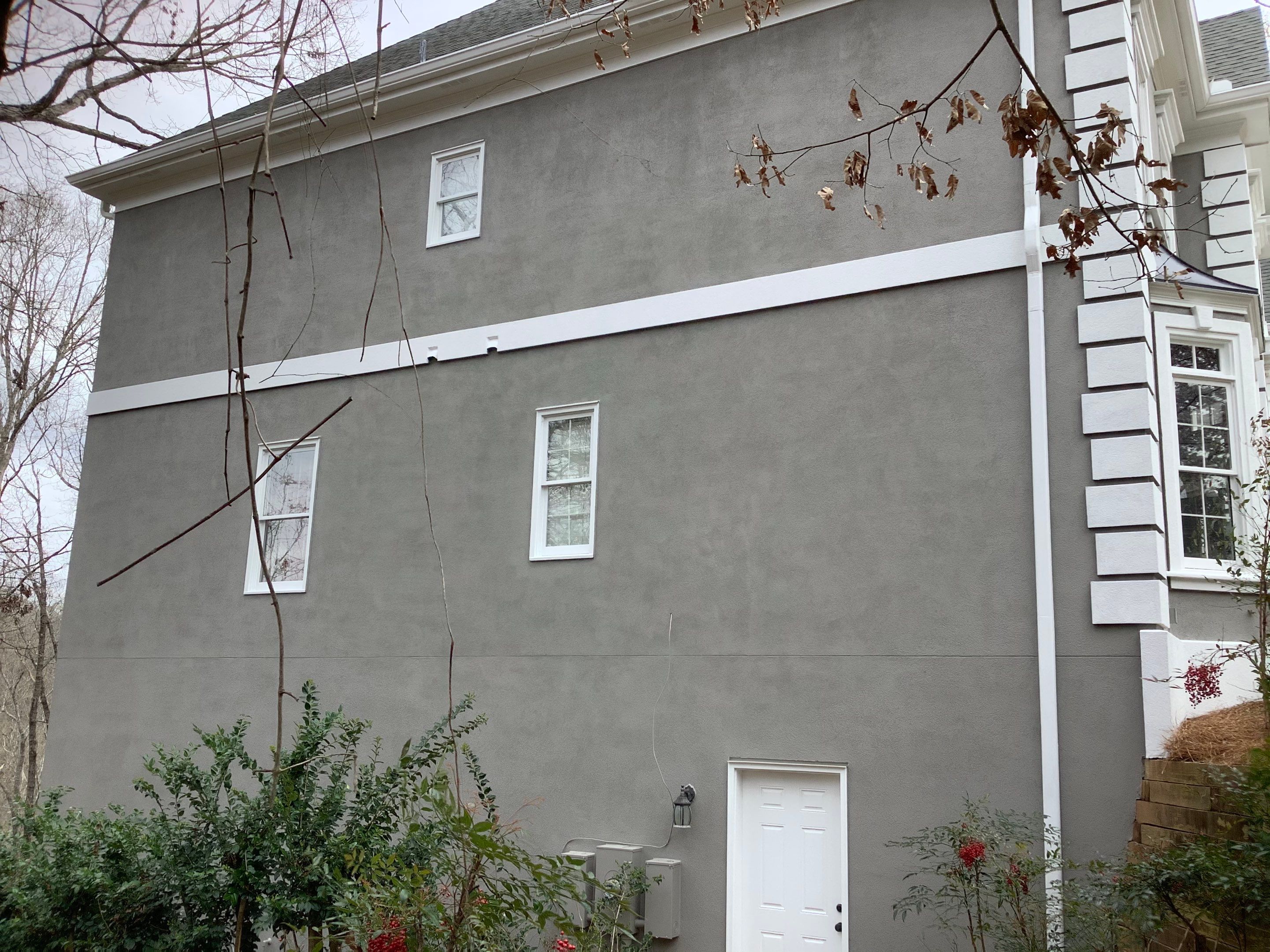 Exterior Stucco Painting and White Trim Update in Roswell by Swift Home Renovations