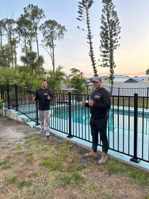 Black Aluminum Pool Fence Installation in Port Charlotte