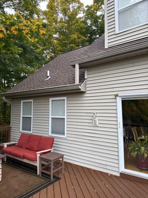 Traverse City Gutter Helmet Installation on a Shingled Roof Home