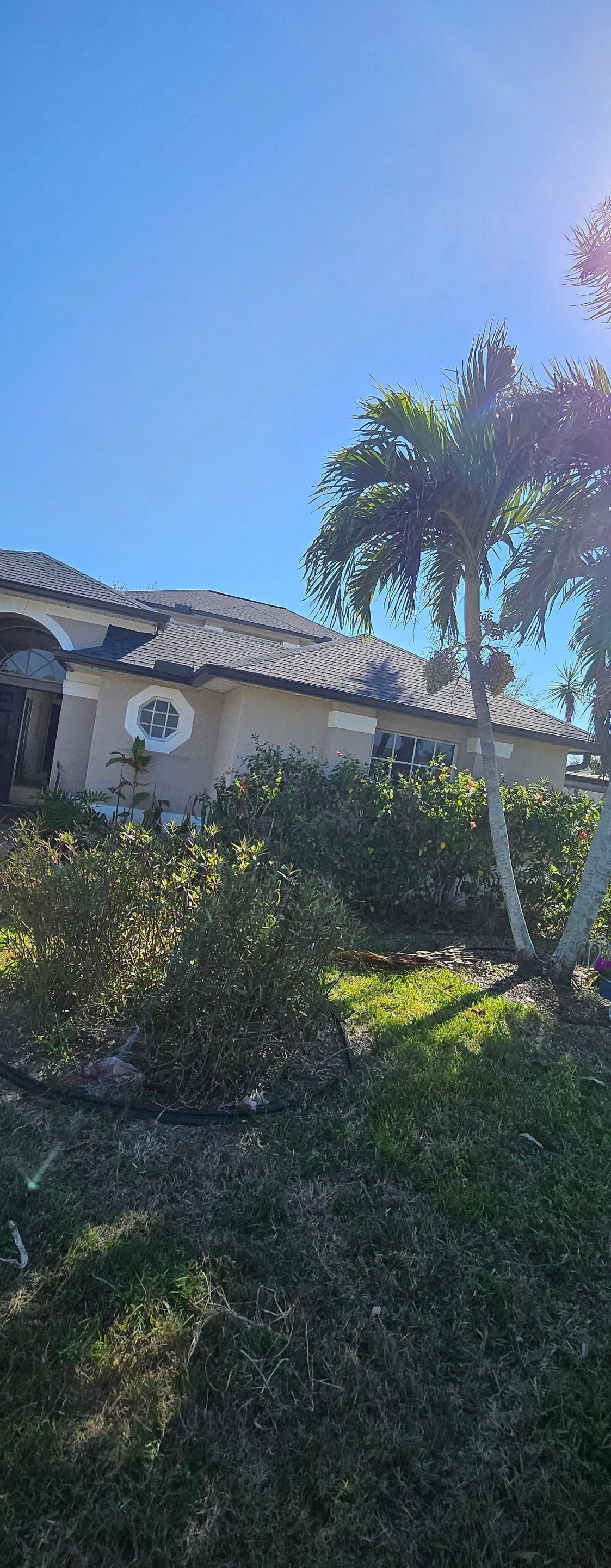 Dark Bronze Seamless Gutters using 6-Inch Seamless Gutters in Cape Coral FL by Gutter Professors