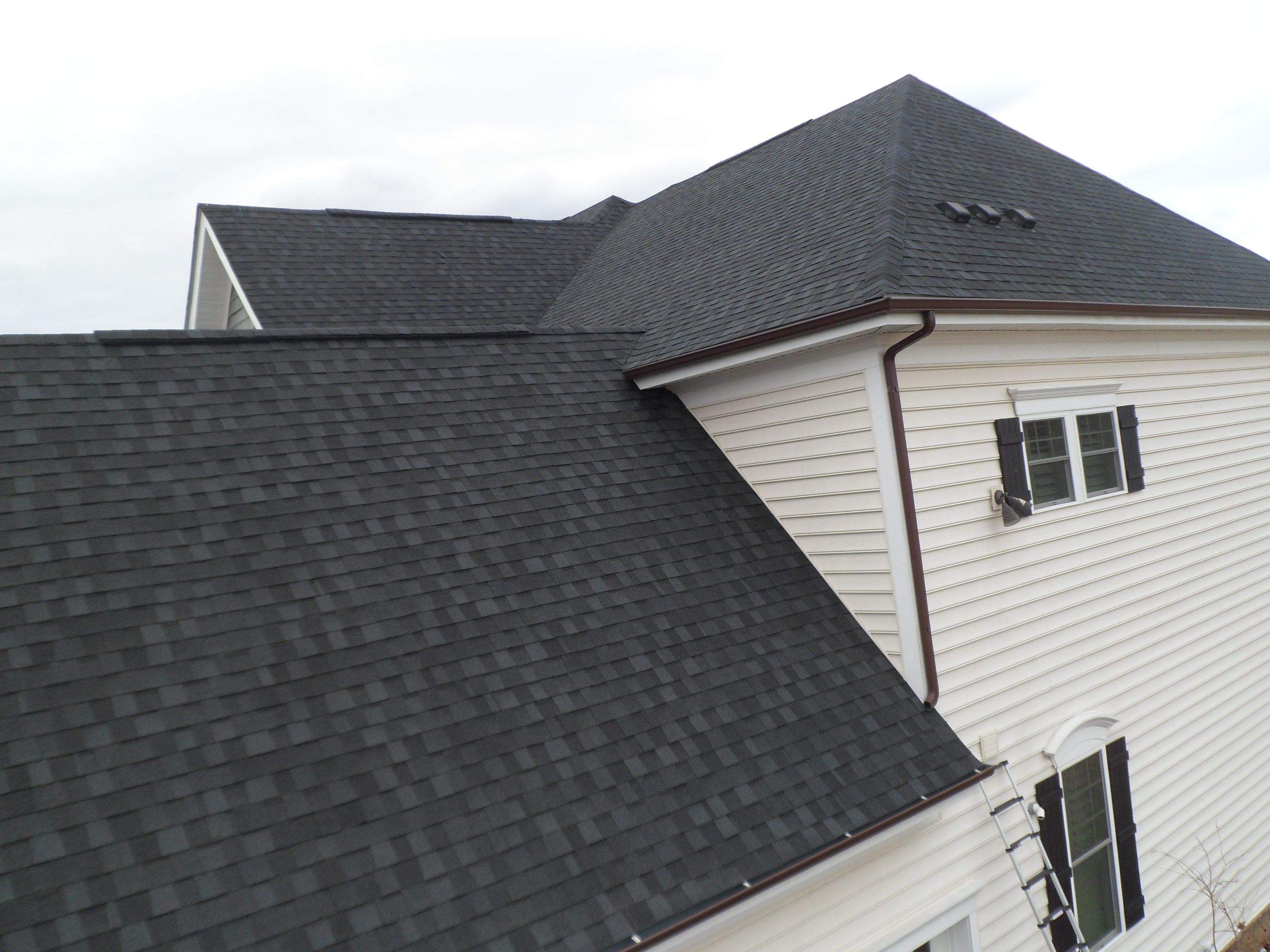 Residential Roofing Repair using Vulkem Black Caulk  by Alpha Design Services