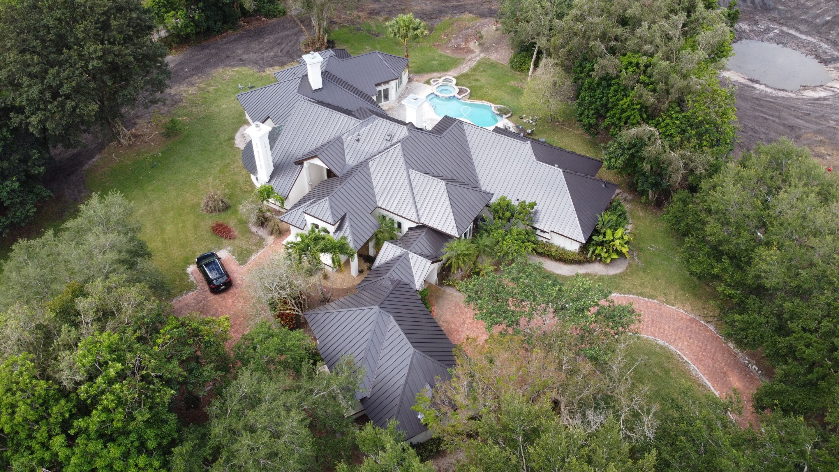 Residential Roofing Installation using 1" Nail strip metal roof by BLUES BROTHERS ROOFING