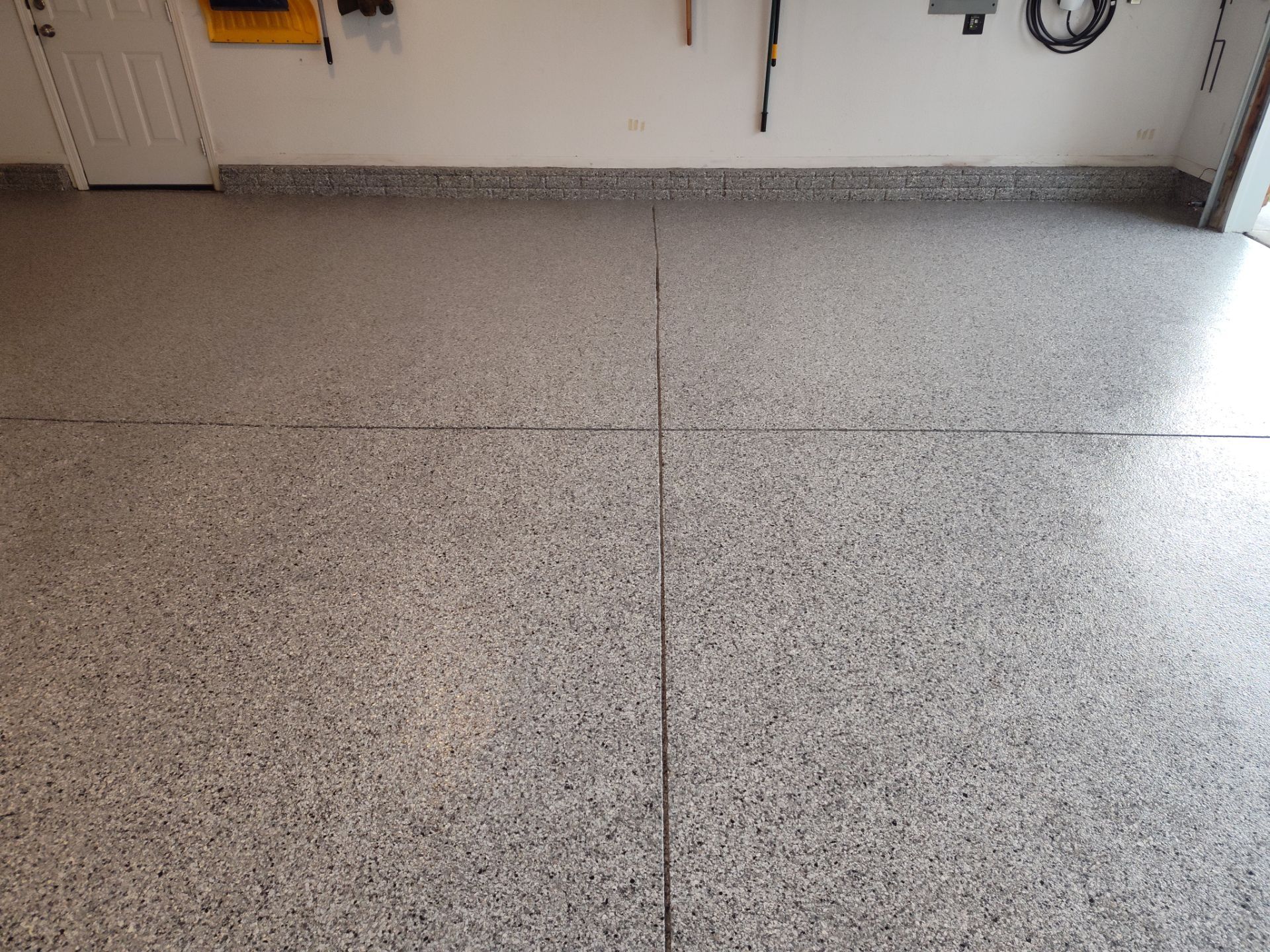 A Garage In One Day Keeps the Rock Salt Away! by Revival Concrete Coatings, LLC