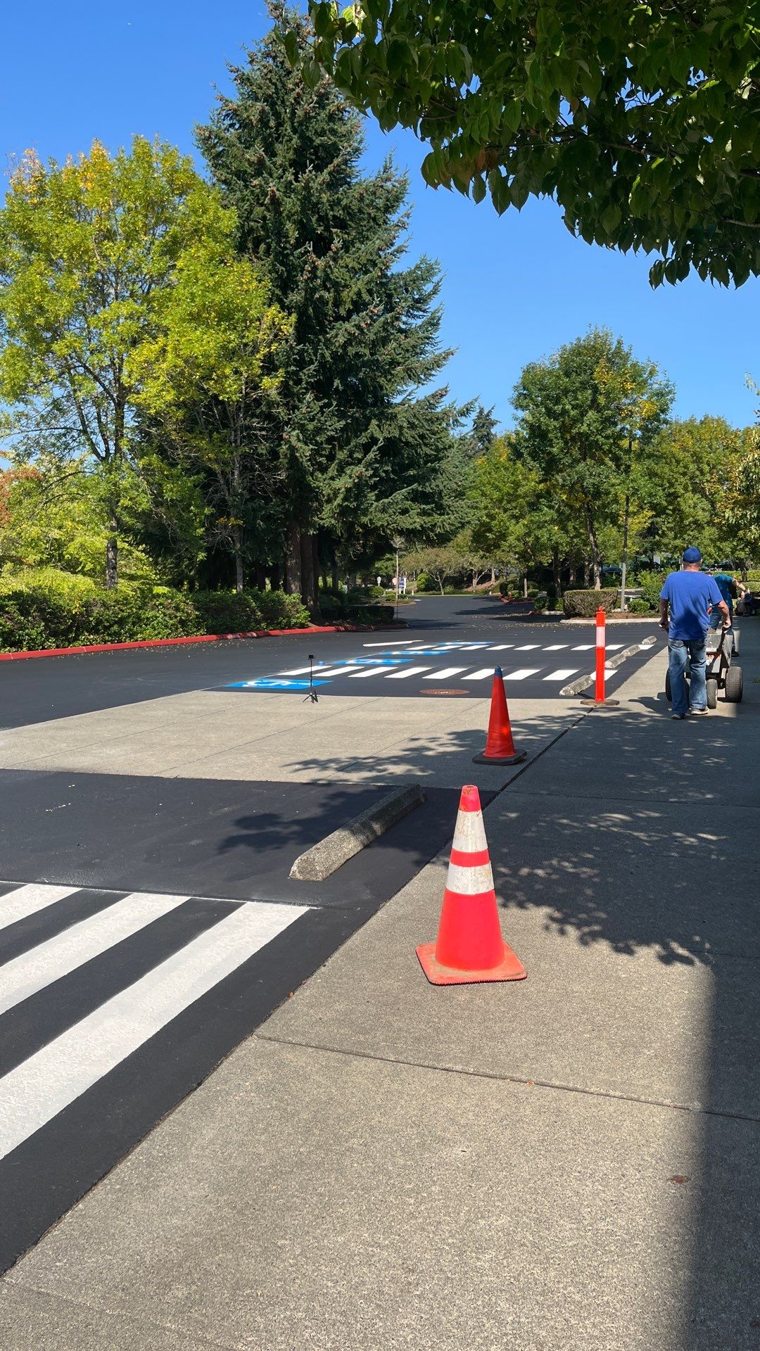 Kidder Matthews | Parking Lot Sealcoating & Striping with Concrete Curb & Patch Repairs  by Jireh Asphalt & Concrete Inc 