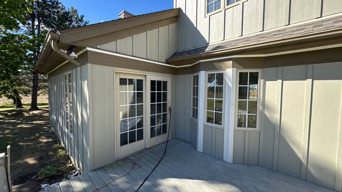 Siding Installation using Hardie Board and Batten Monterey Taupe by Nitro Roofing and Construction