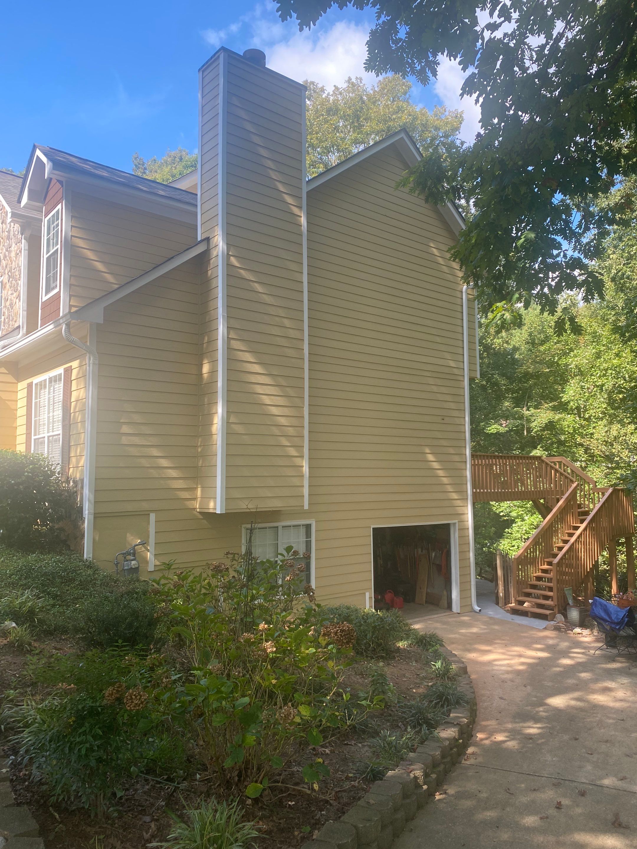 Full Exterior House Painting for Suburban Residence in Douglasville by Swift Home Renovations