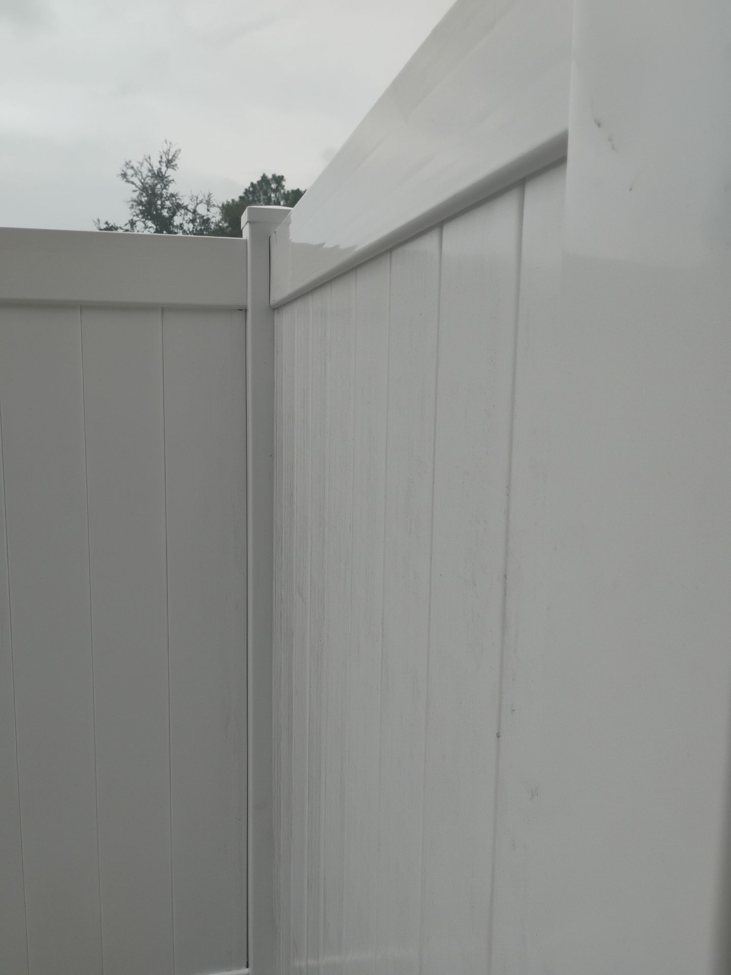 White Vinyl Privacy Fence Installation and Gate Assembly in Punta Gorda by True Fence LLC