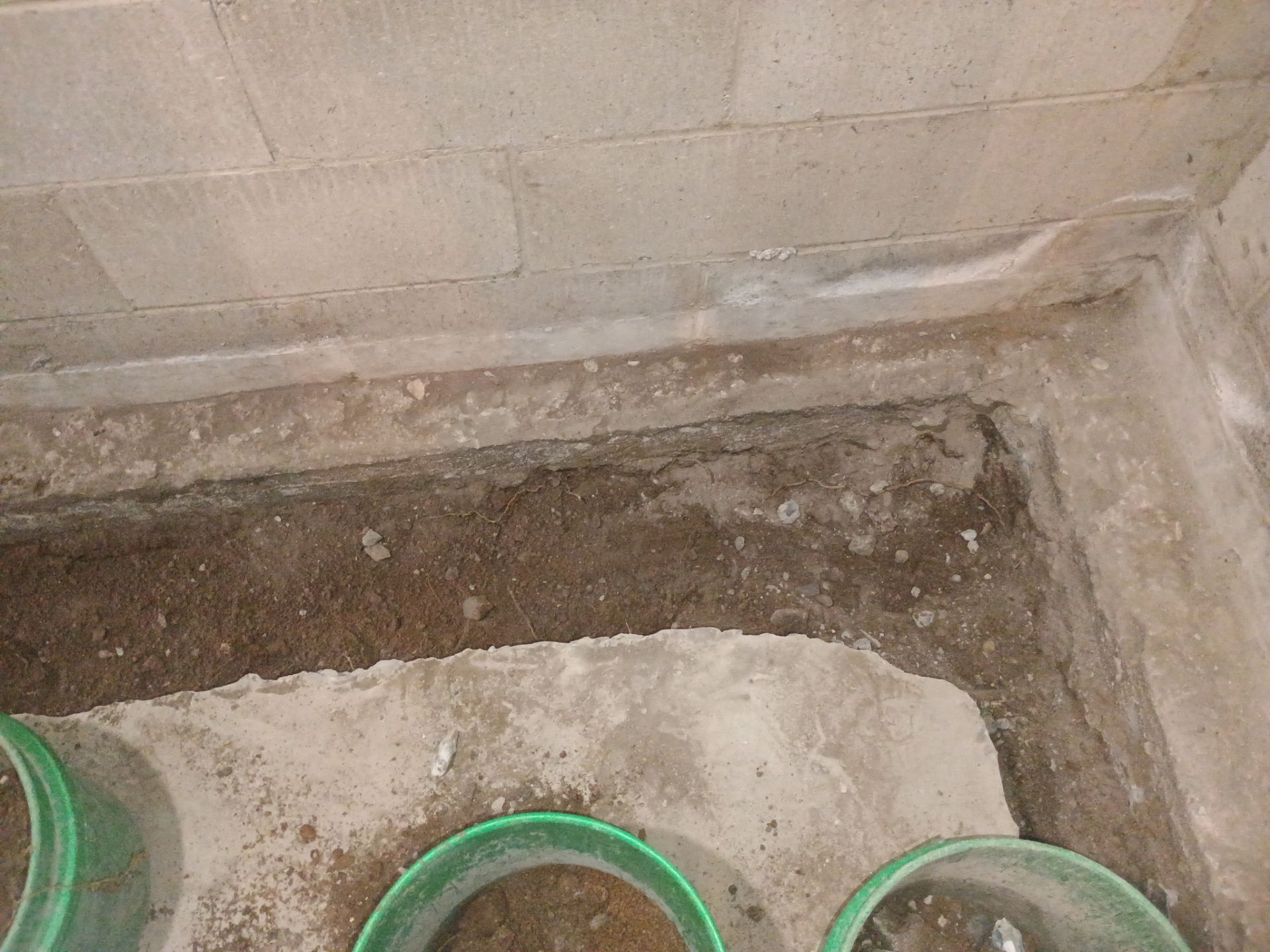 Interior Drain Tile & Buried Discharge in South Minneapolis by Waterproofing Northeast