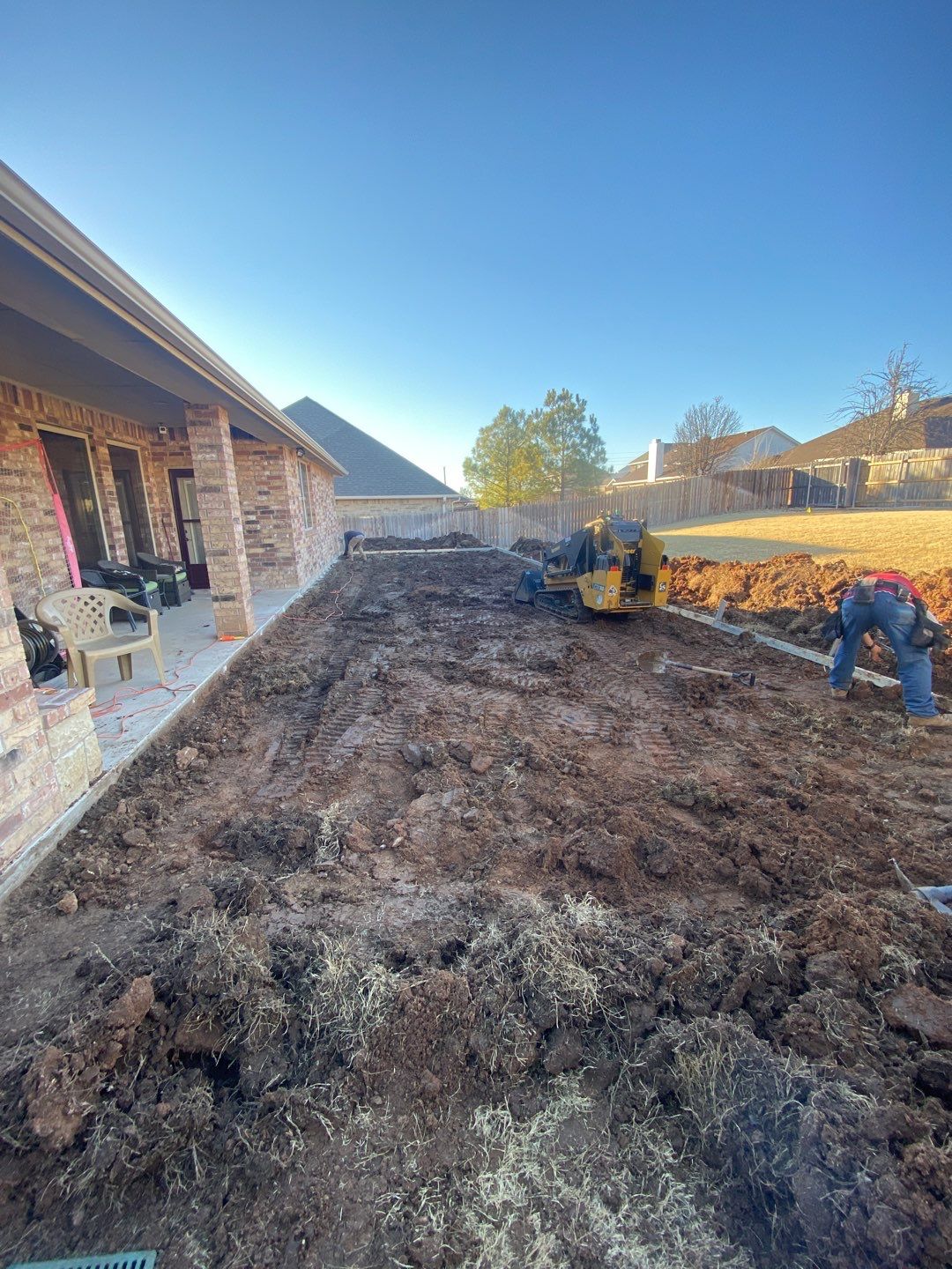 Concrete Slab , Retaining Wall , Fence, and landscape. by Clays Services Inc