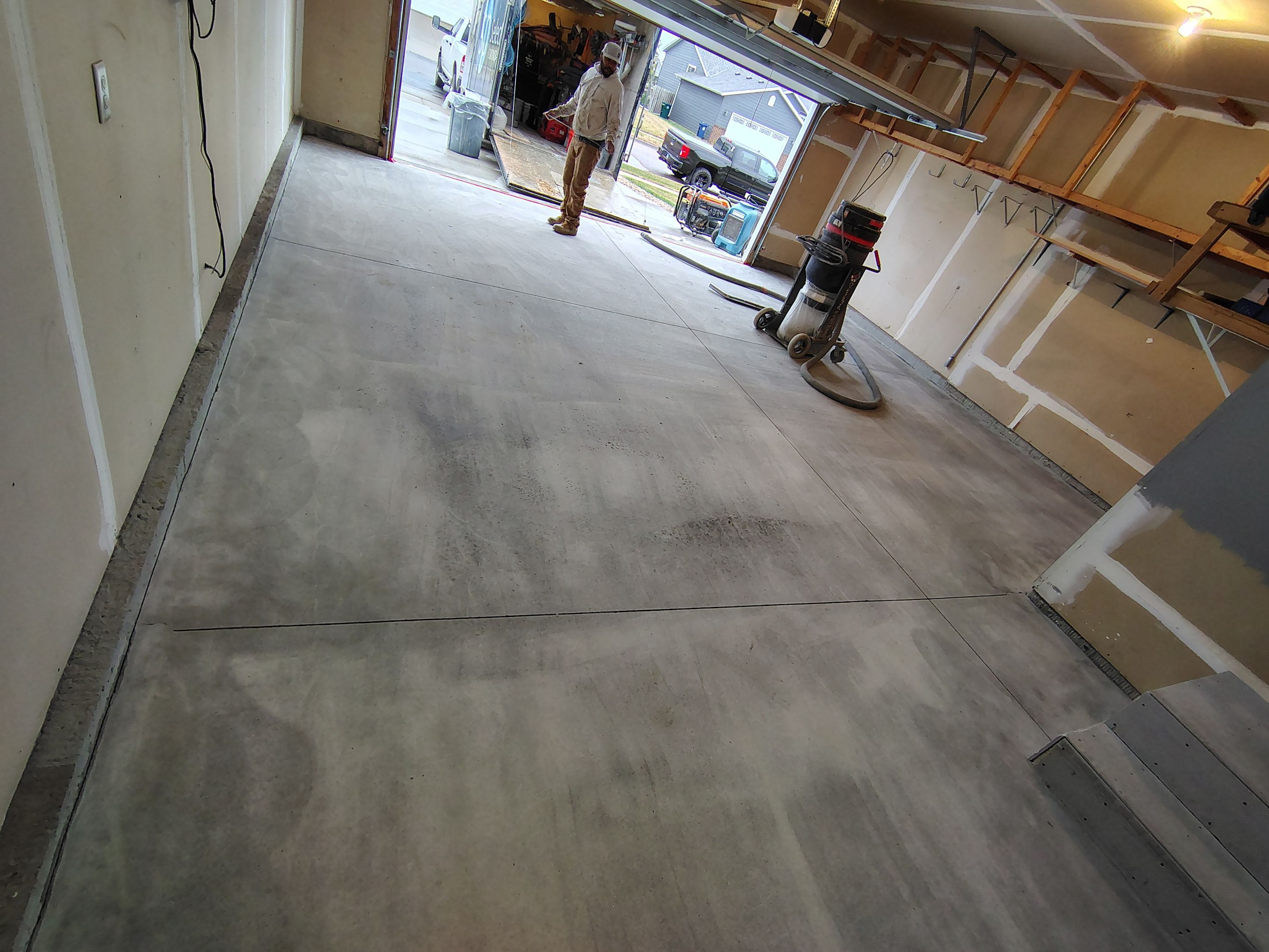 Nightfall Grey Speckled Epoxy Garage Floor Coating in Sioux Falls by Select Painting, Coatings & Garage Cabinets