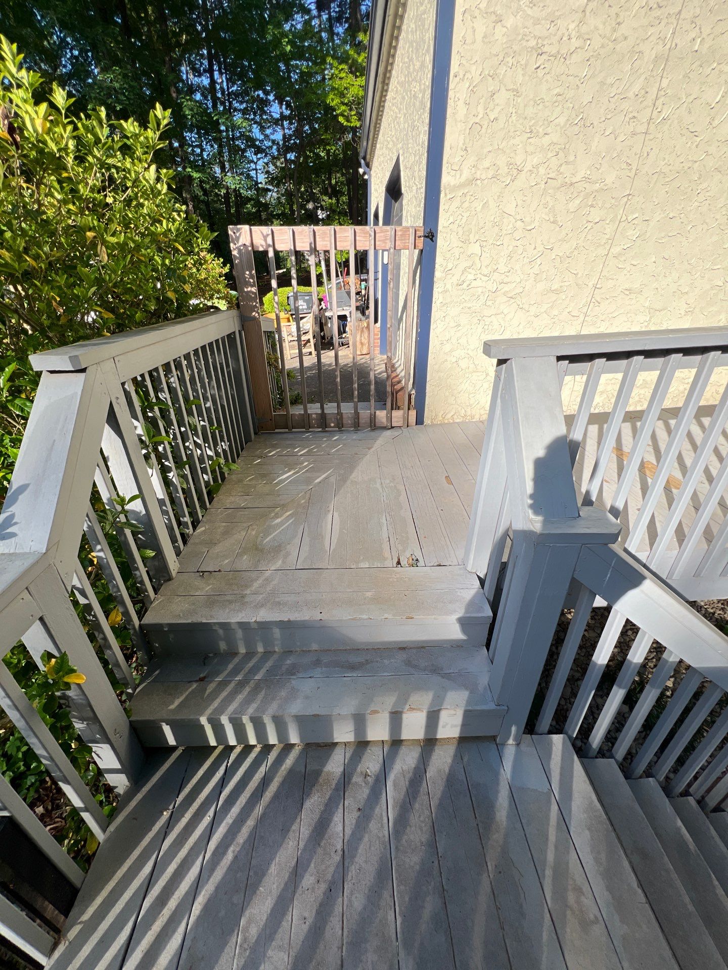 Pressure-Treated Wood Deck Resurfacing and Staircase Reconstruction in Canton by Swift Home Renovations