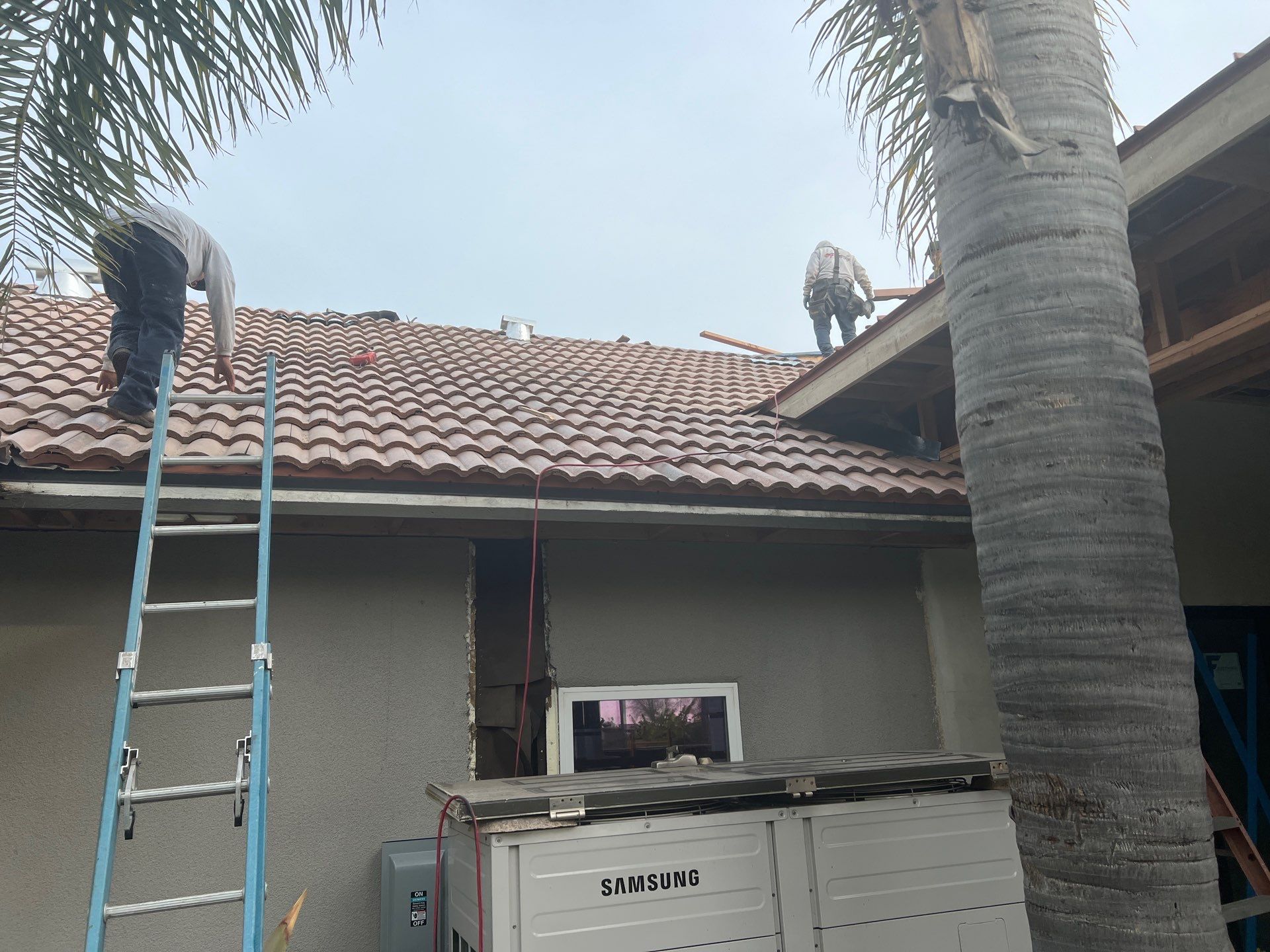 Tile, Metal, and TPO roofing project (new construction) by Straight Edge Roofing Inc