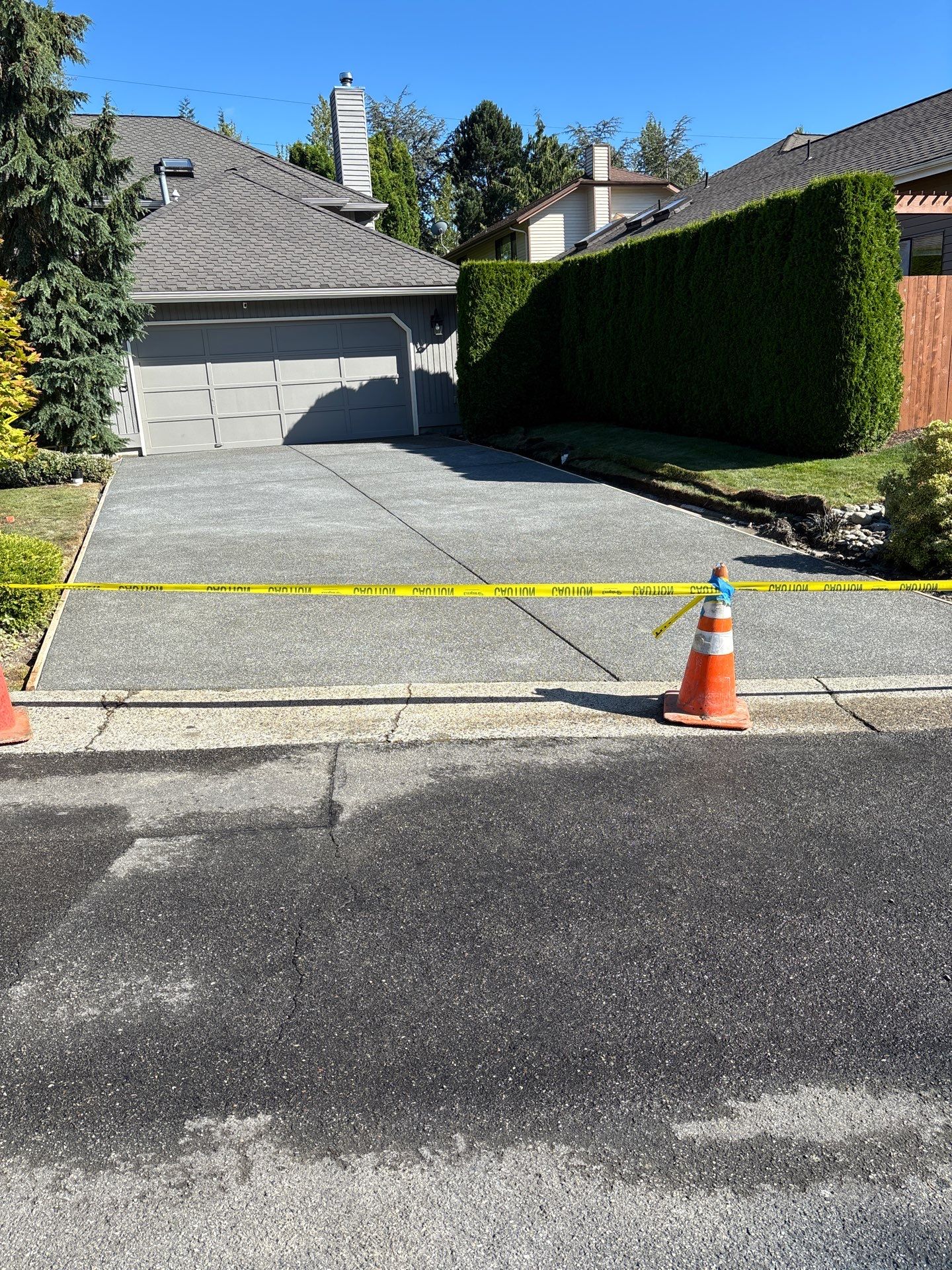Exposed Aggregate Concrete Driveway Makeover  by Jireh Asphalt & Concrete Inc 
