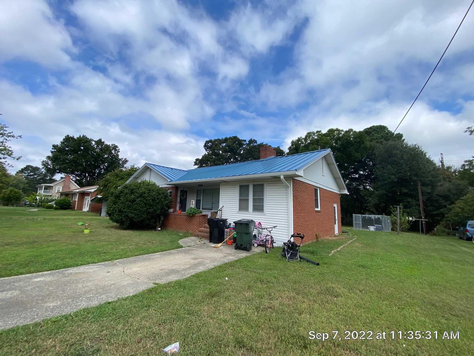 Carolina Blue Standing Seam Roof by Just In Time Roofing and Restoration